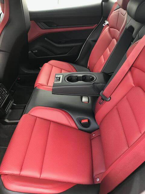 Porsche Taycan My pictures and experience with my Standard White 4S+ armrest folded downt