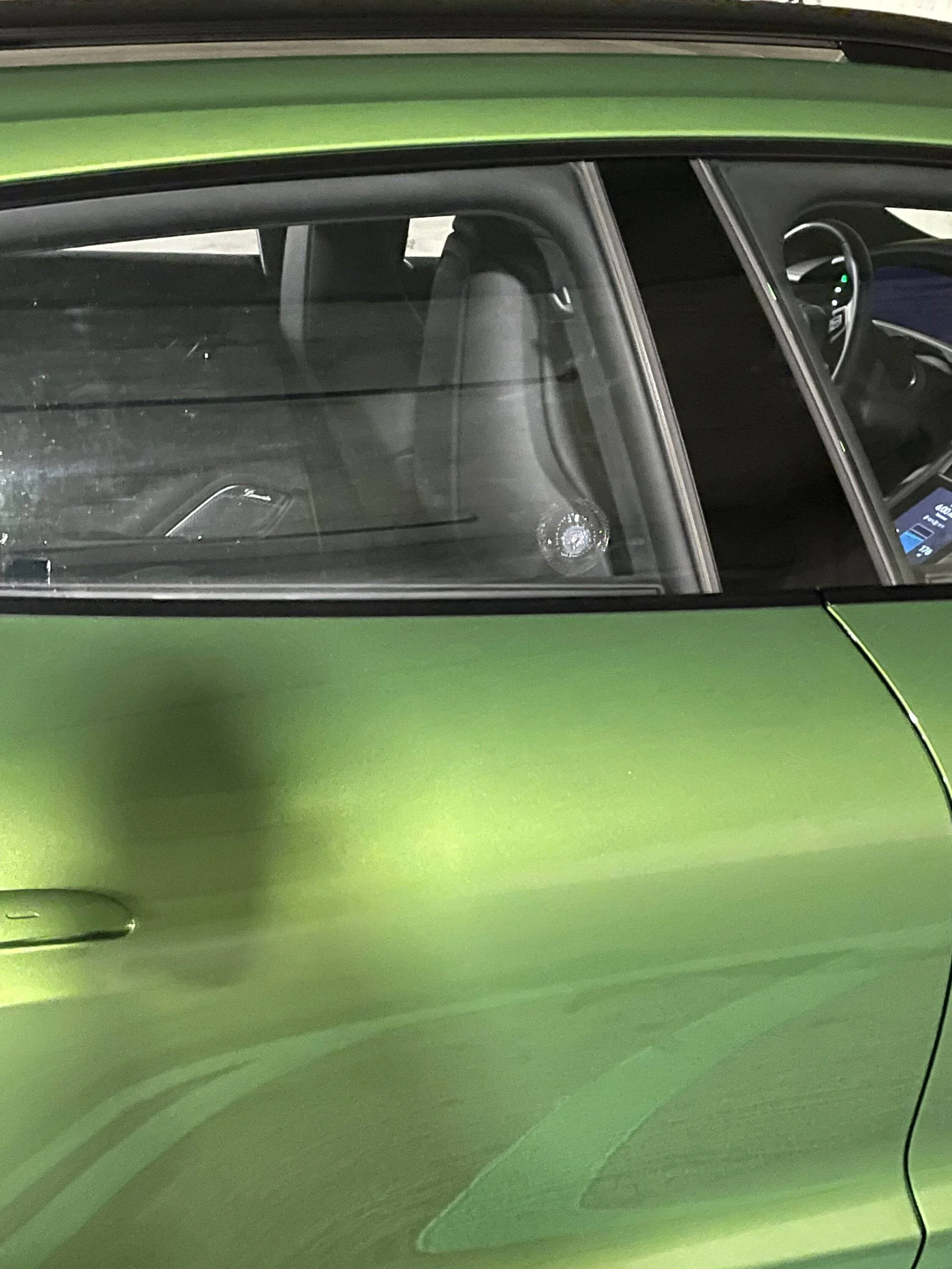 Porsche Taycan Thermally and noise insulated glass defect IMG_6590