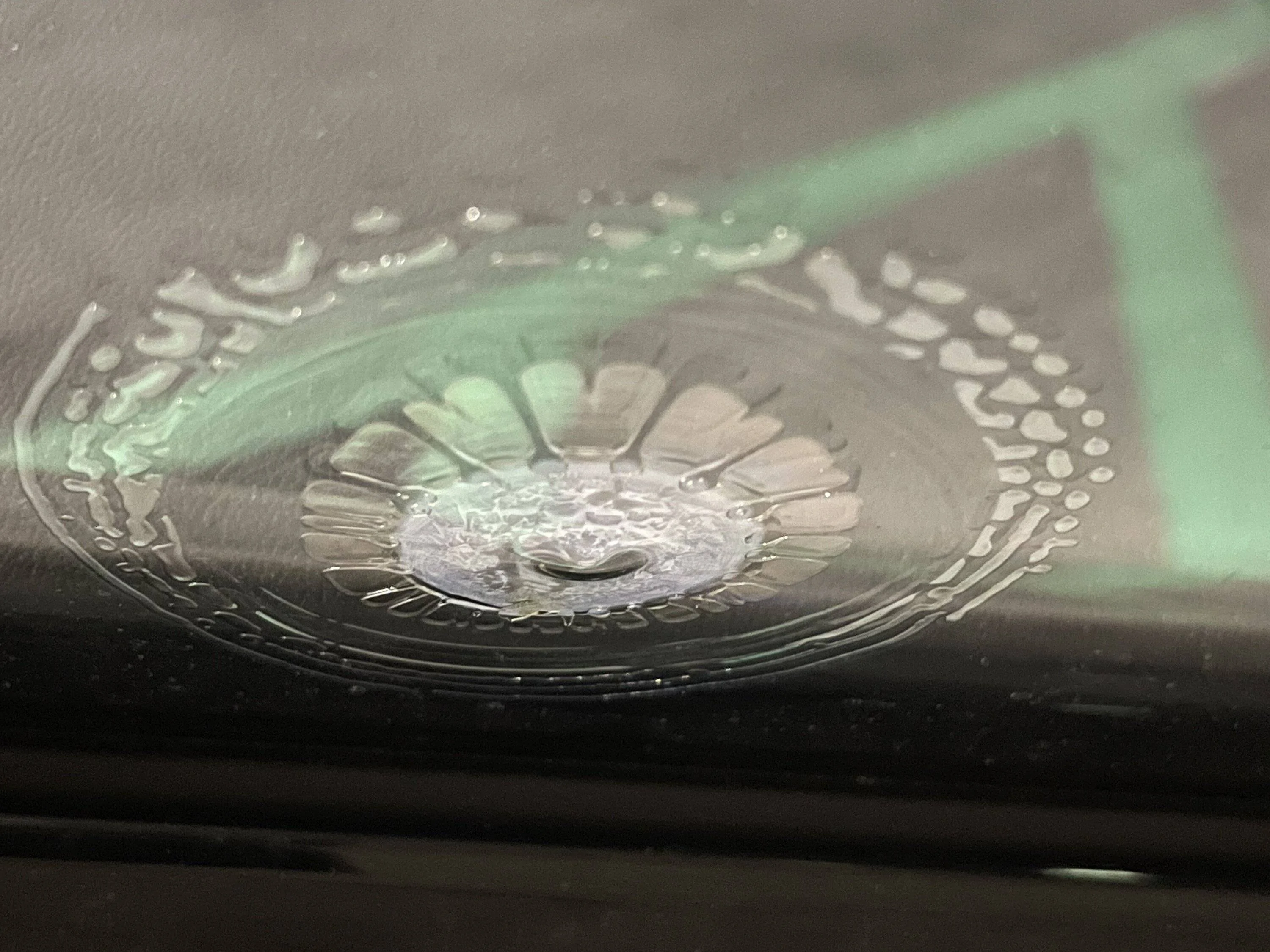 Porsche Taycan Thermally and noise insulated glass defect IMG_6587