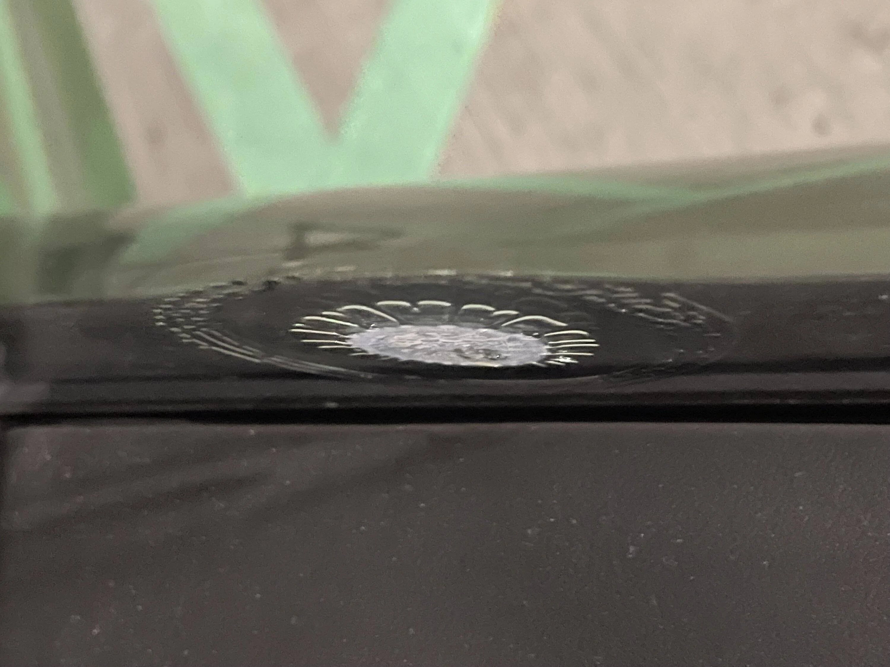Porsche Taycan Thermally and noise insulated glass defect IMG_6584