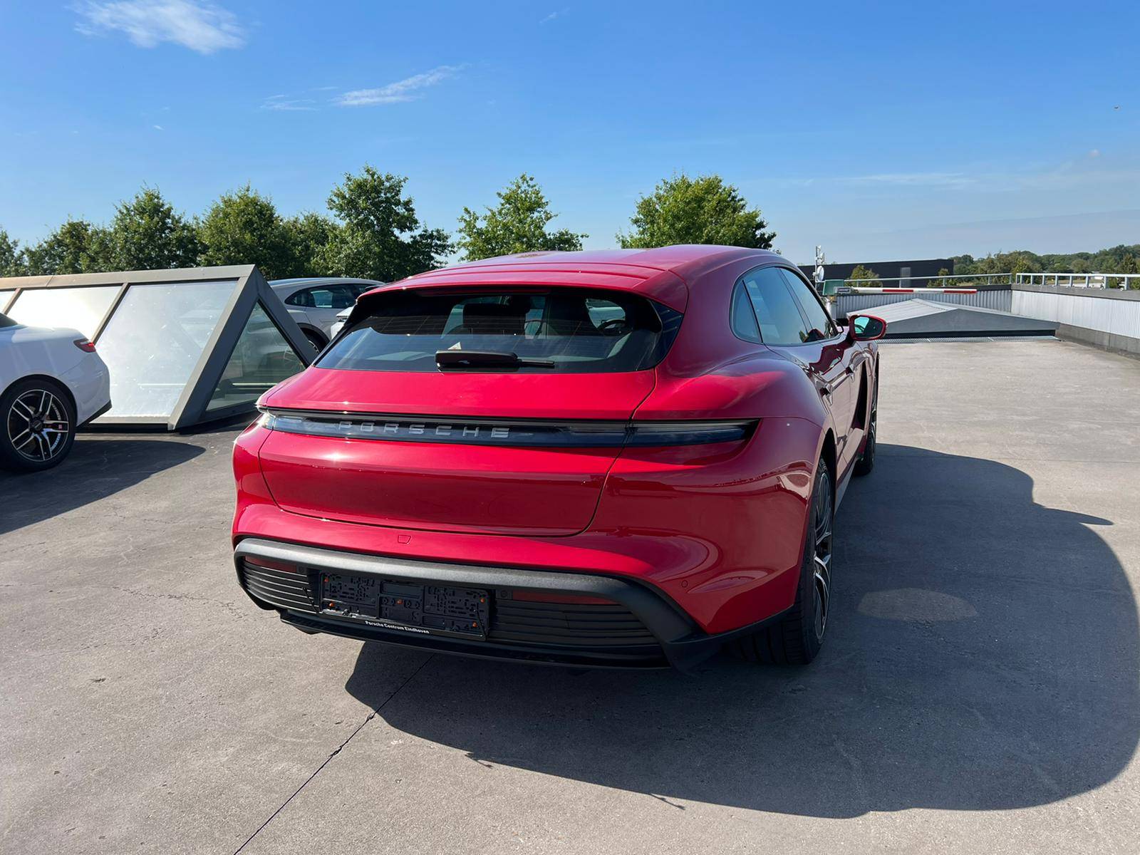 Porsche Taycan CARMINE RED Taycan Club WhatsApp Image 2022-08-23 at 11.46.26 AM