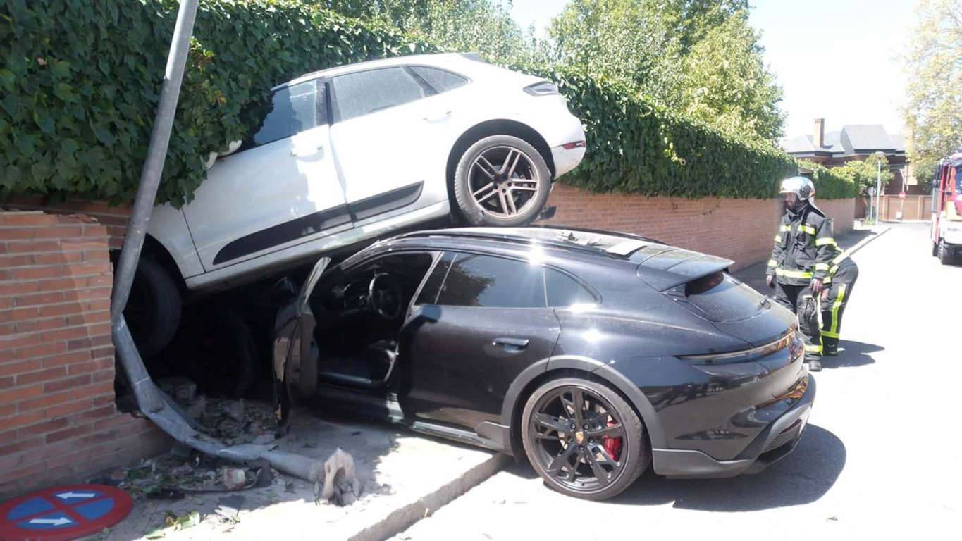 Porsche Taycan Don't Insert Sexist Bad Drivers Joke Here... Taycan Crashes Into (and Under) Parked Macan AA114253