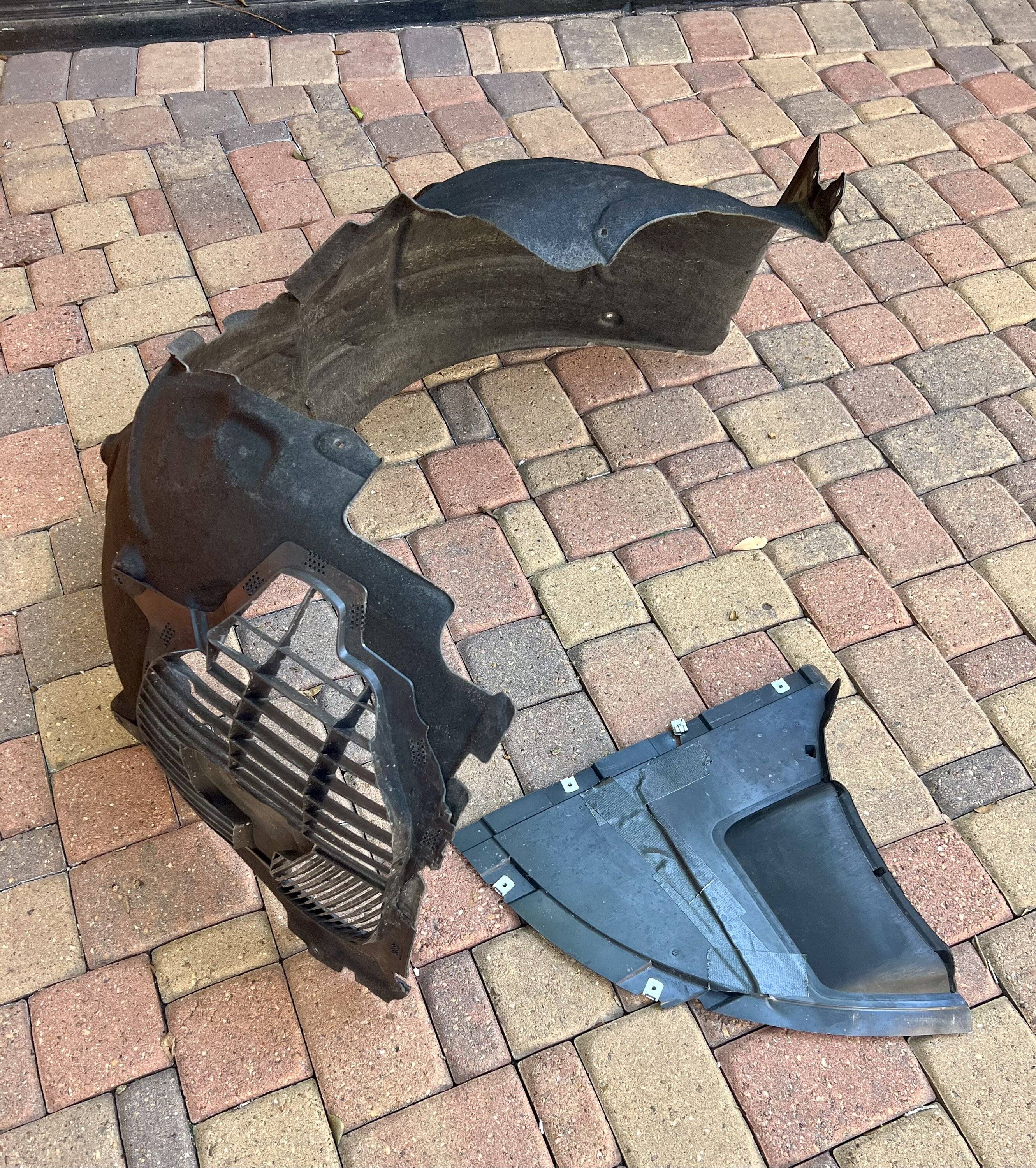 Porsche Taycan Replaced road damaged plastic on underside of CT IMG_6823