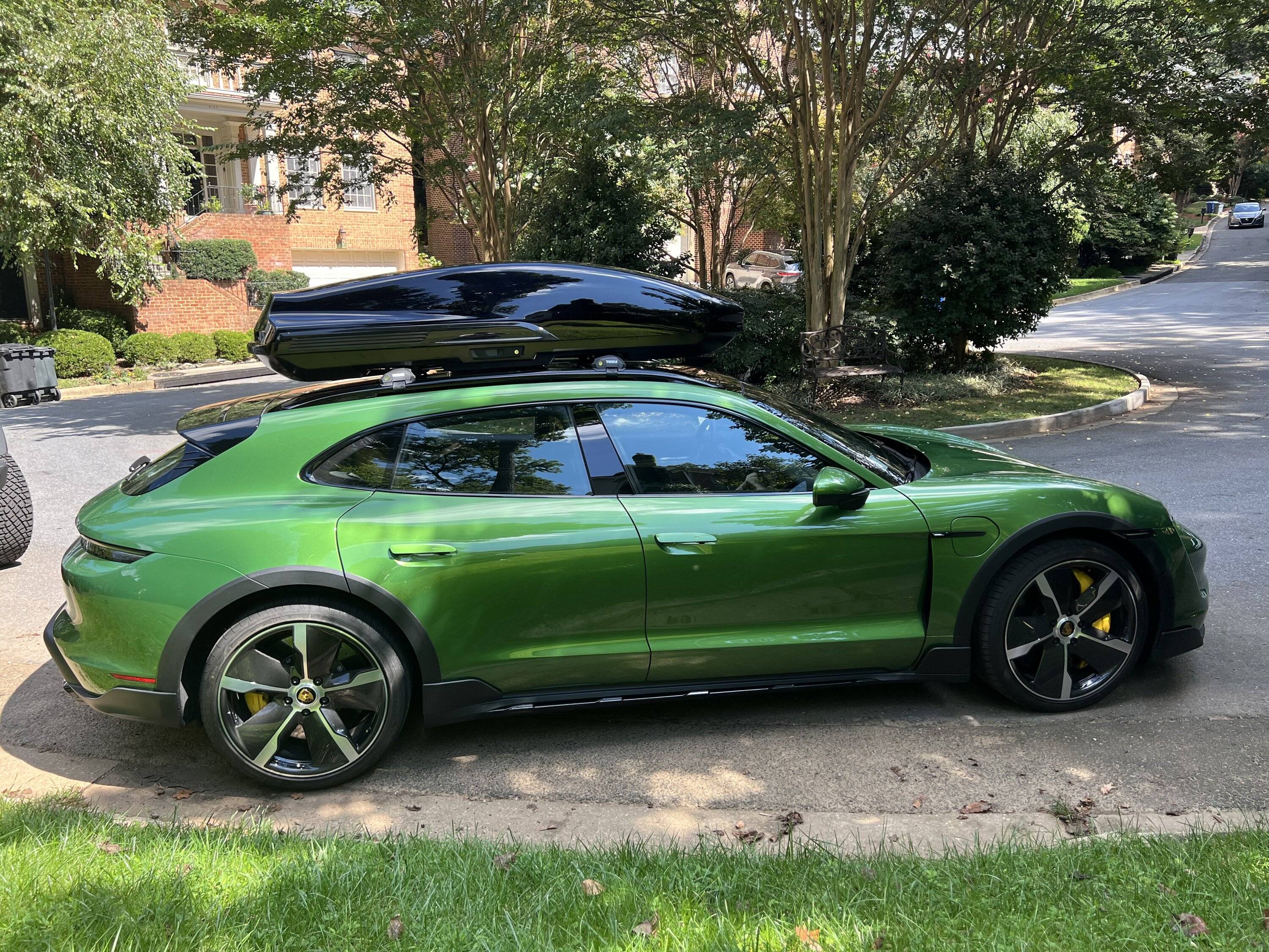 Porsche Taycan Taycan colour -- metallic black or Mamba Green 6655552D-625F-4C57-9637-BAC66072ABA2