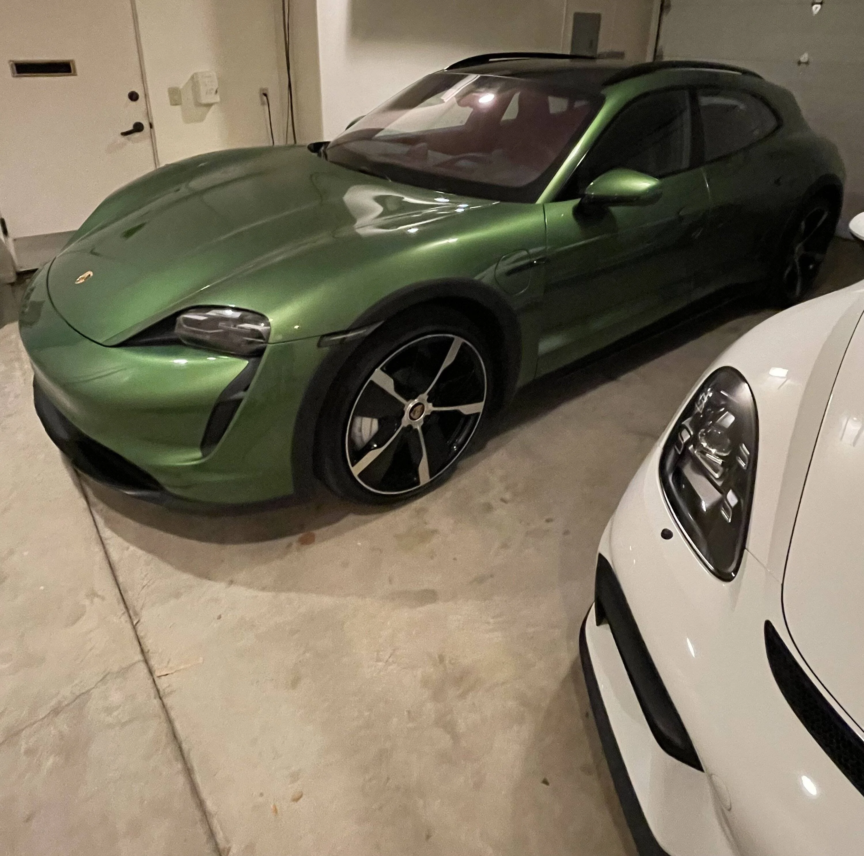 Porsche Taycan Taycan colour -- metallic black or Mamba Green IMG_7198
