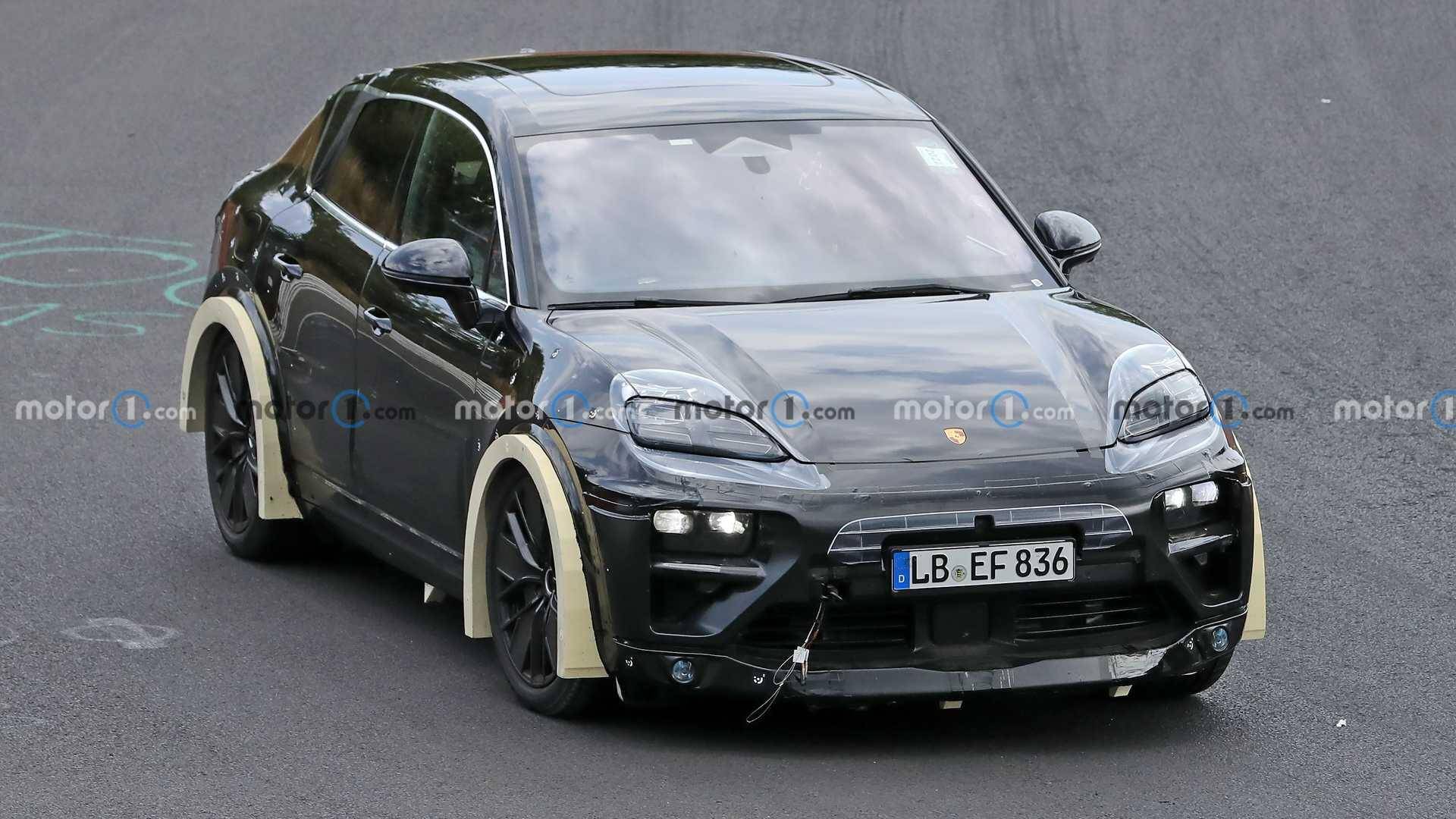 Porsche Taycan "Porsche Macan EV Spied Testing At Nurburgring With Strange Aero Bits" - Link 1663339369281