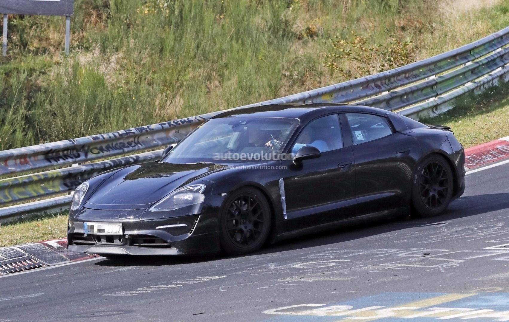 Porsche Taycan Facelift 2024 Taycan Sedan and Sport Turismo Test Prototypes Spied (Note: bumper still covered / camouflaged) 📸 porsche-mission-e-flies-on-nurburgring-prototype-shows-more-skin-121281_1