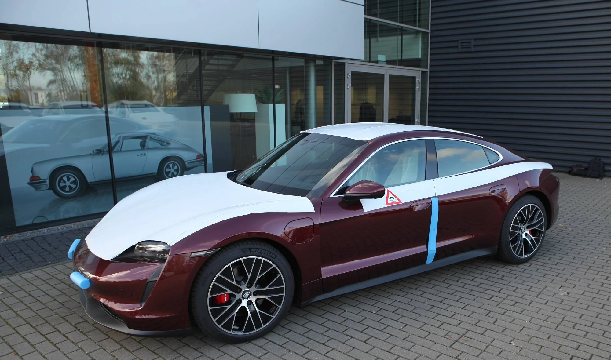 Porsche Taycan Has anybody whose car was in storage in Germany awaiting a 12V battery had their car delivered yet? IMG_0362 — kopia