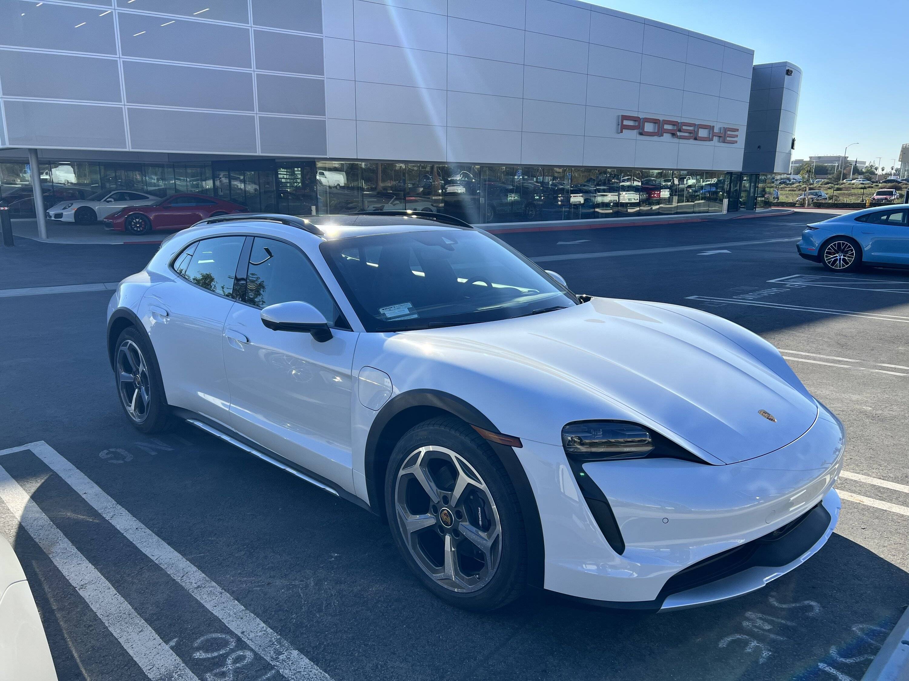 Porsche Taycan Anyone on GRAND PHOENIX? 69231602830__551268DC-842D-47B5-8199-AAD404A0BDE0