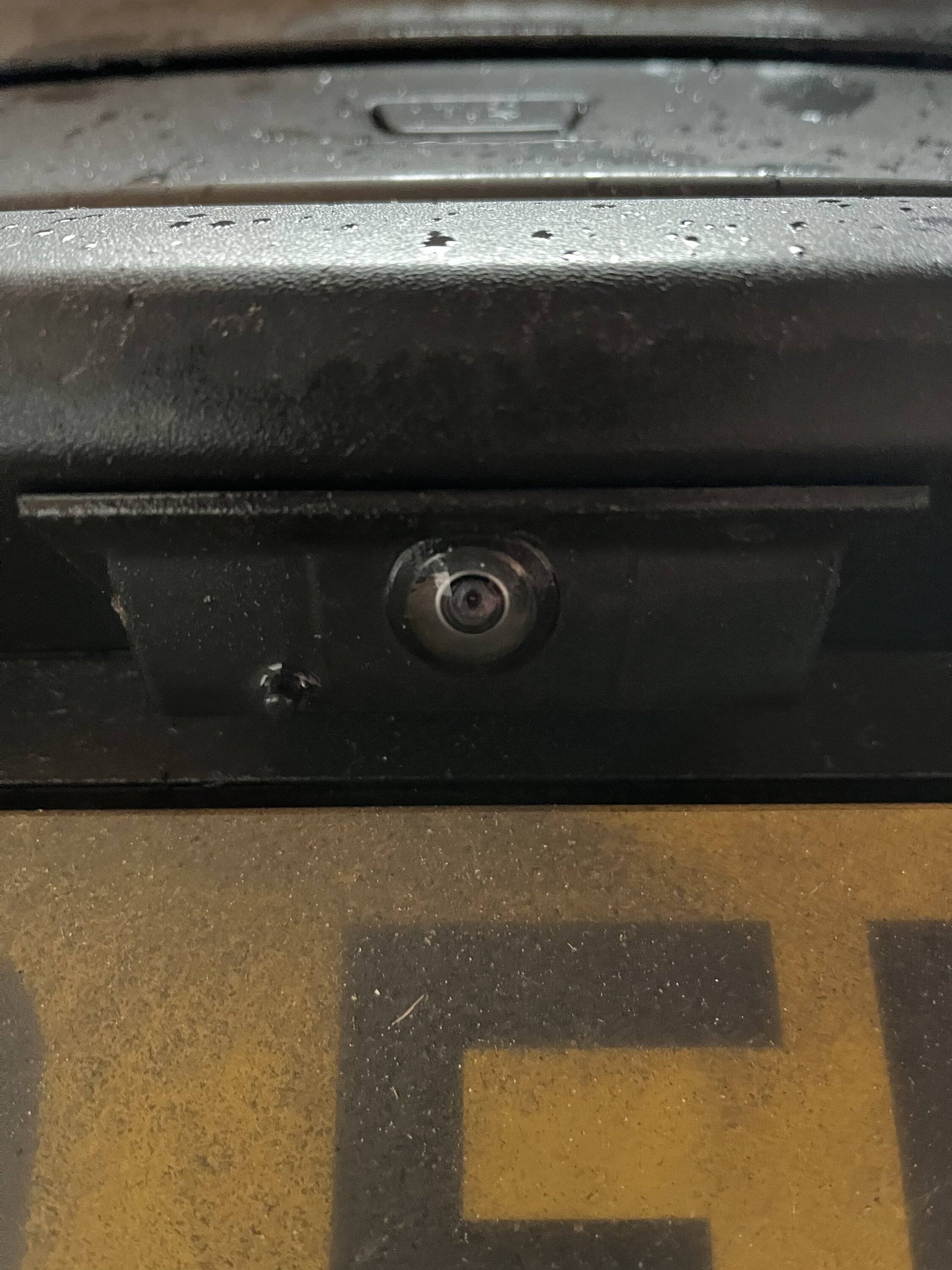 Porsche Taycan Reverse camera lens - small oval 4503042D-4639-4978-942E-2E63FCCDB025