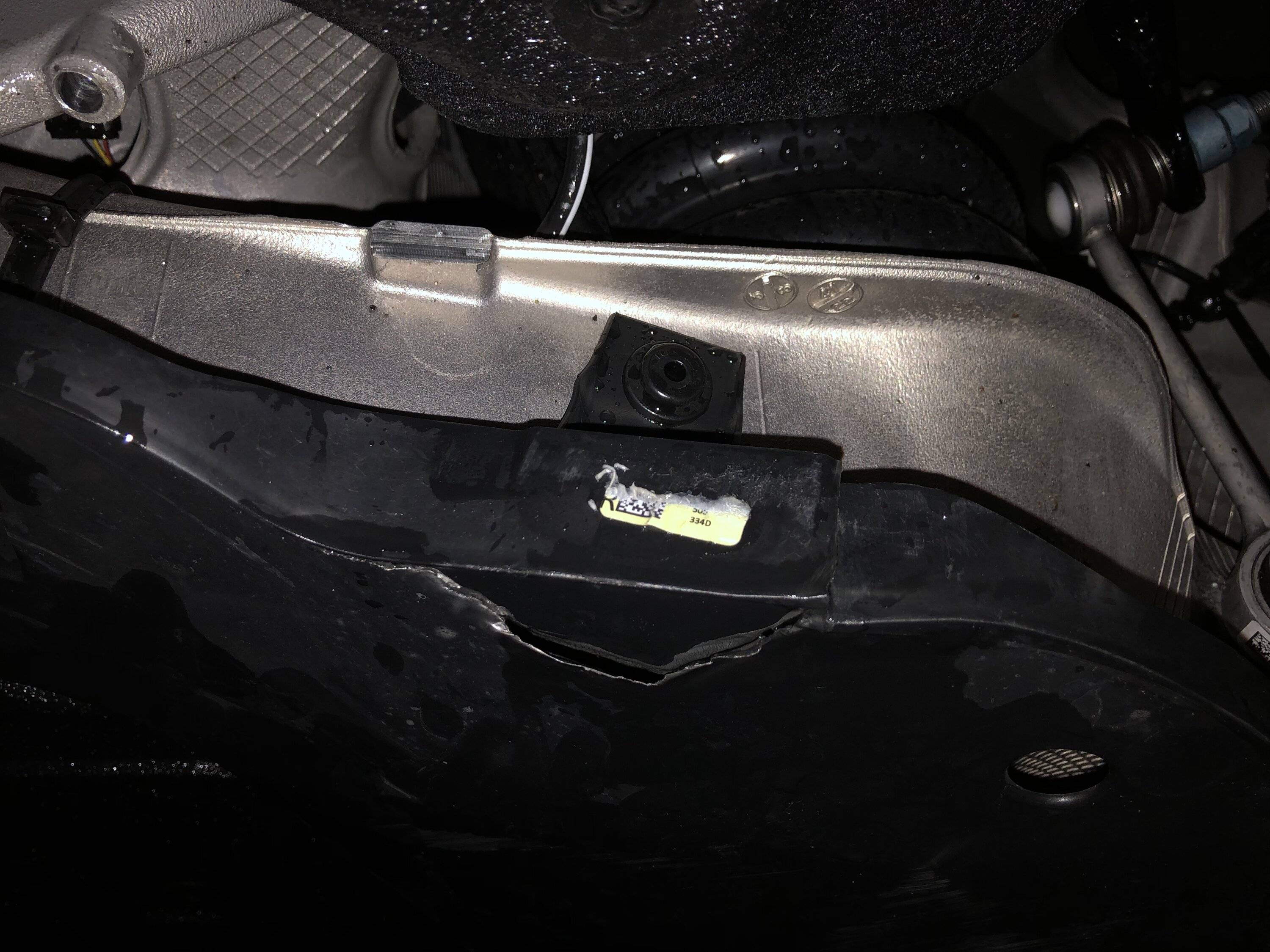 Porsche Taycan Cracked plastic piece under car. Need help identifying part number or name please! 4C3FA957-40D3-4794-8EE0-217B79C2F67D