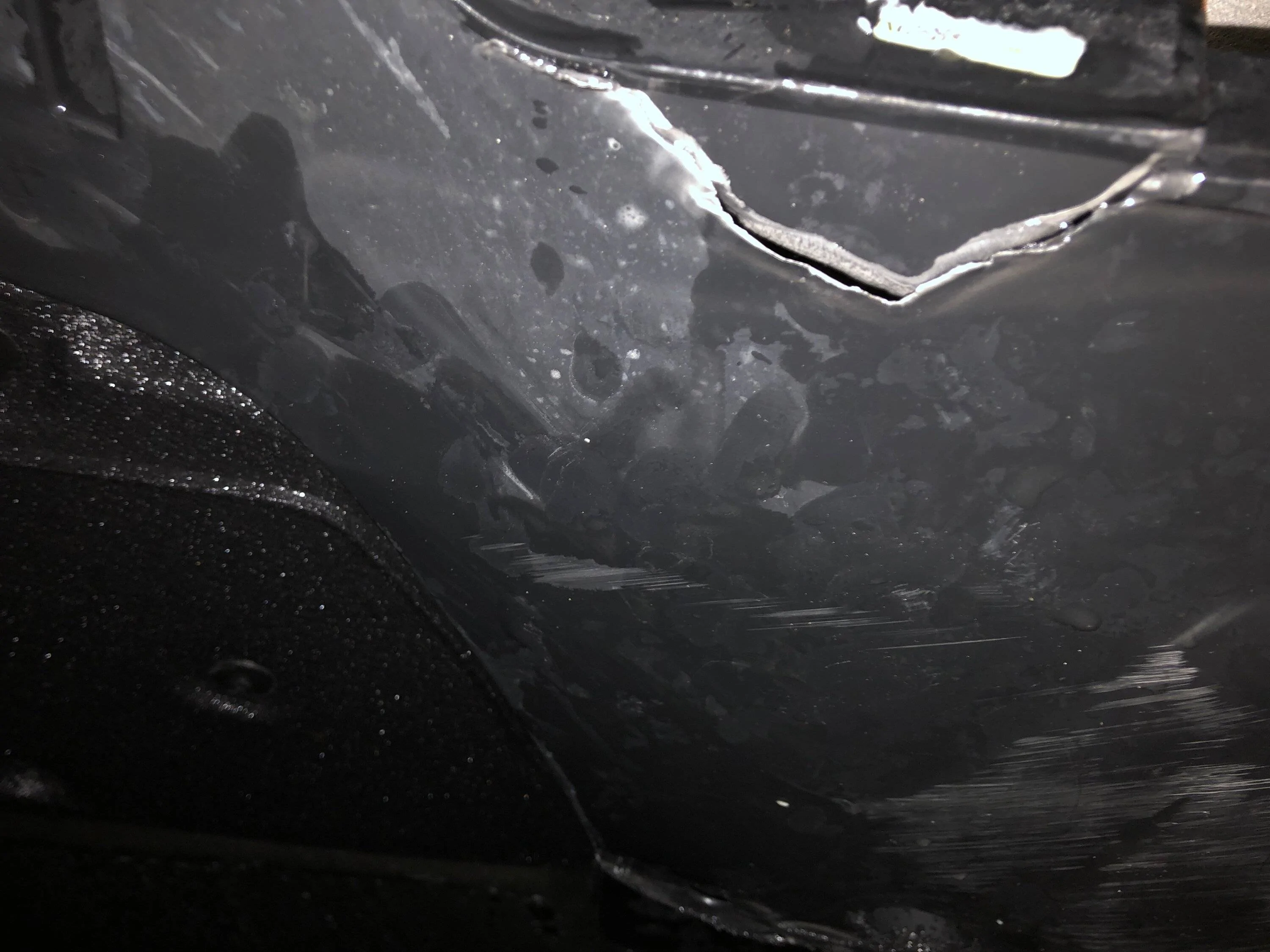Porsche Taycan Cracked plastic piece under car. Need help identifying part number or name please! 6465965C-7EE5-42F9-9DE0-690A9D019787