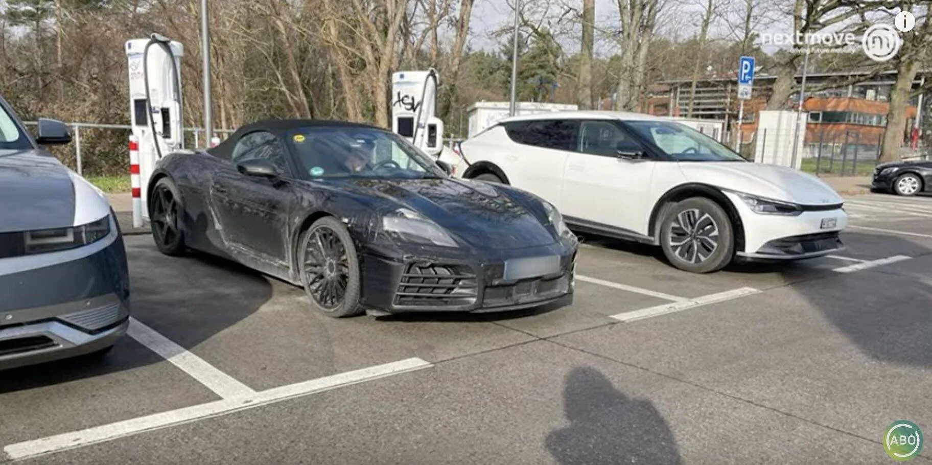 Porsche Taycan Porsche 718 Boxster convertible EV spotted charging at 170kw rate 1E69FE46-0035-4429-BA21-B6662FDA3606