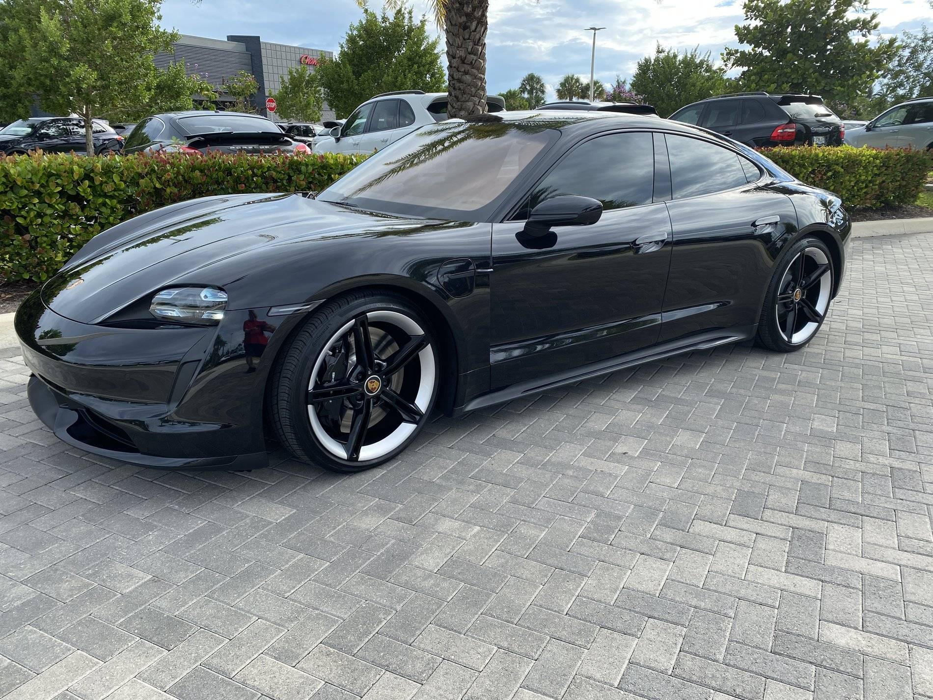 Porsche Taycan It’s here! Who said black does not show lines? 61412409150__7E3C0F63-A9AB-40BB-B938-340CA698FA3E.JPG
