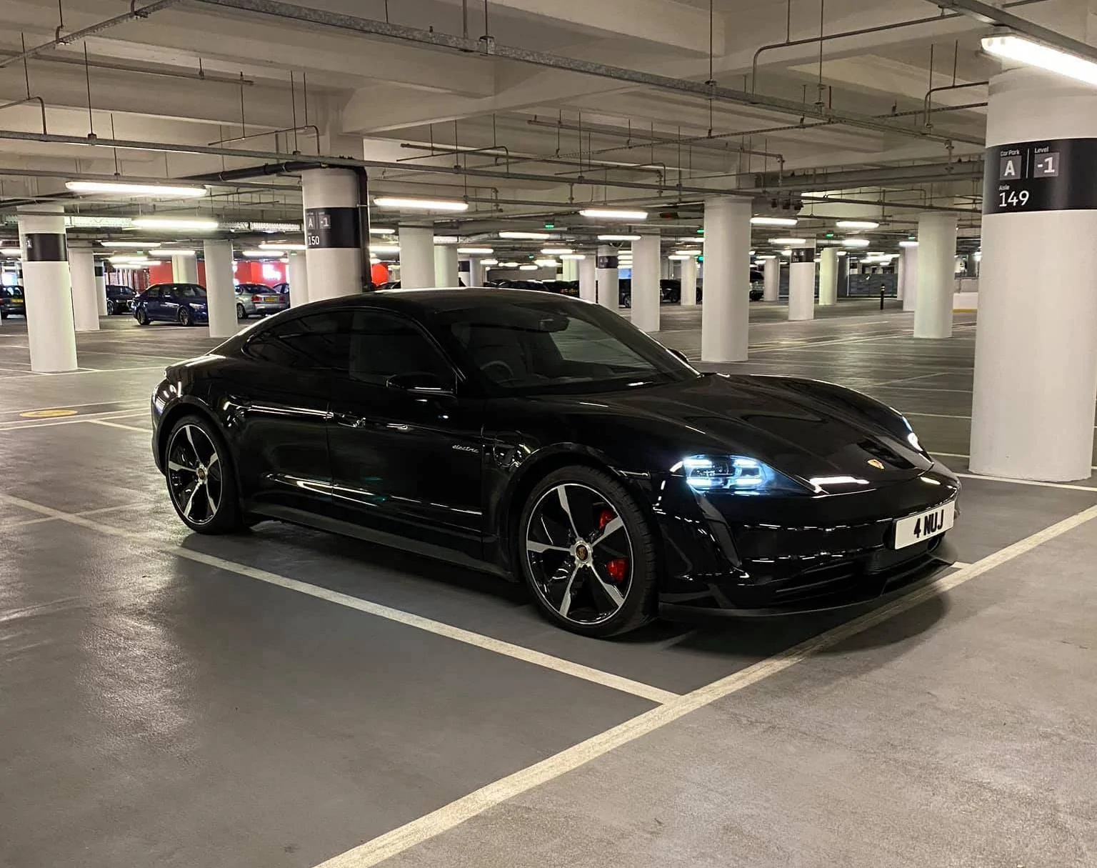 Porsche Taycan BLACK / JET BLACK Taycan Club Glacier Ice Blue LED DRL Black Porsche Taycan