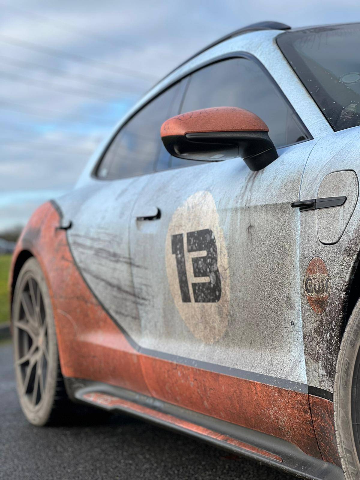 Porsche Taycan Ironic distressed wrap GTS Sports Turismo. Dirty! 29A1EE19-8891-4015-A1CB-E73C87CA5C53