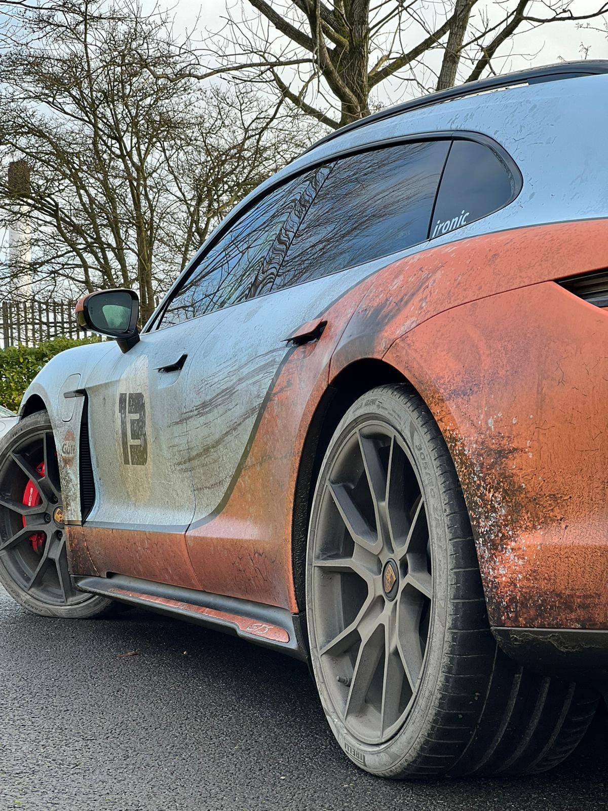 Porsche Taycan Ironic distressed wrap GTS Sports Turismo. Dirty! 09923B9B-7FE9-4C6C-AFCC-DE420217C83C