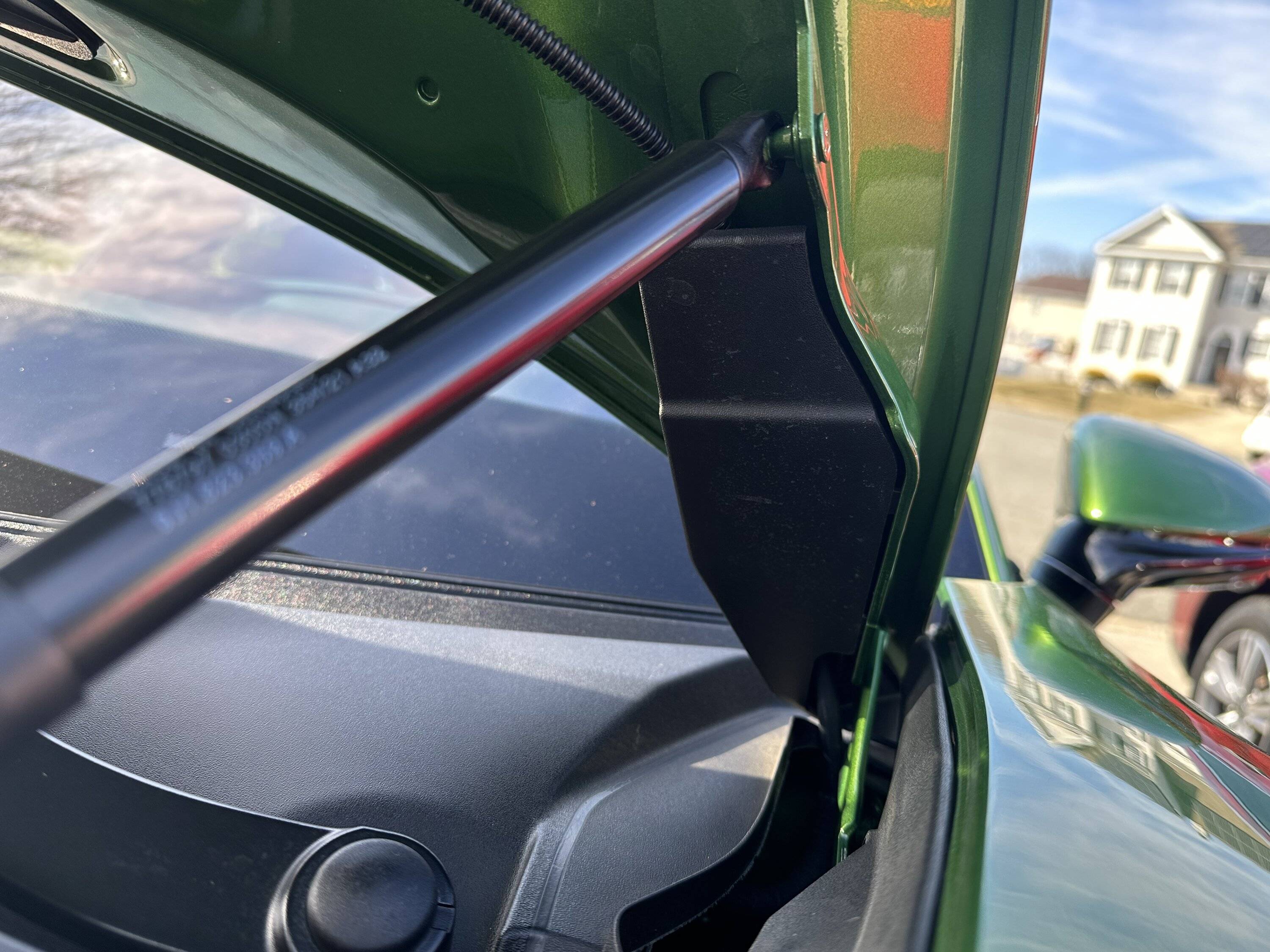 Porsche Taycan Black plastic hinge covers (under front hood) always loose B5231901-FD71-432C-A340-C9CBD95C2CE3