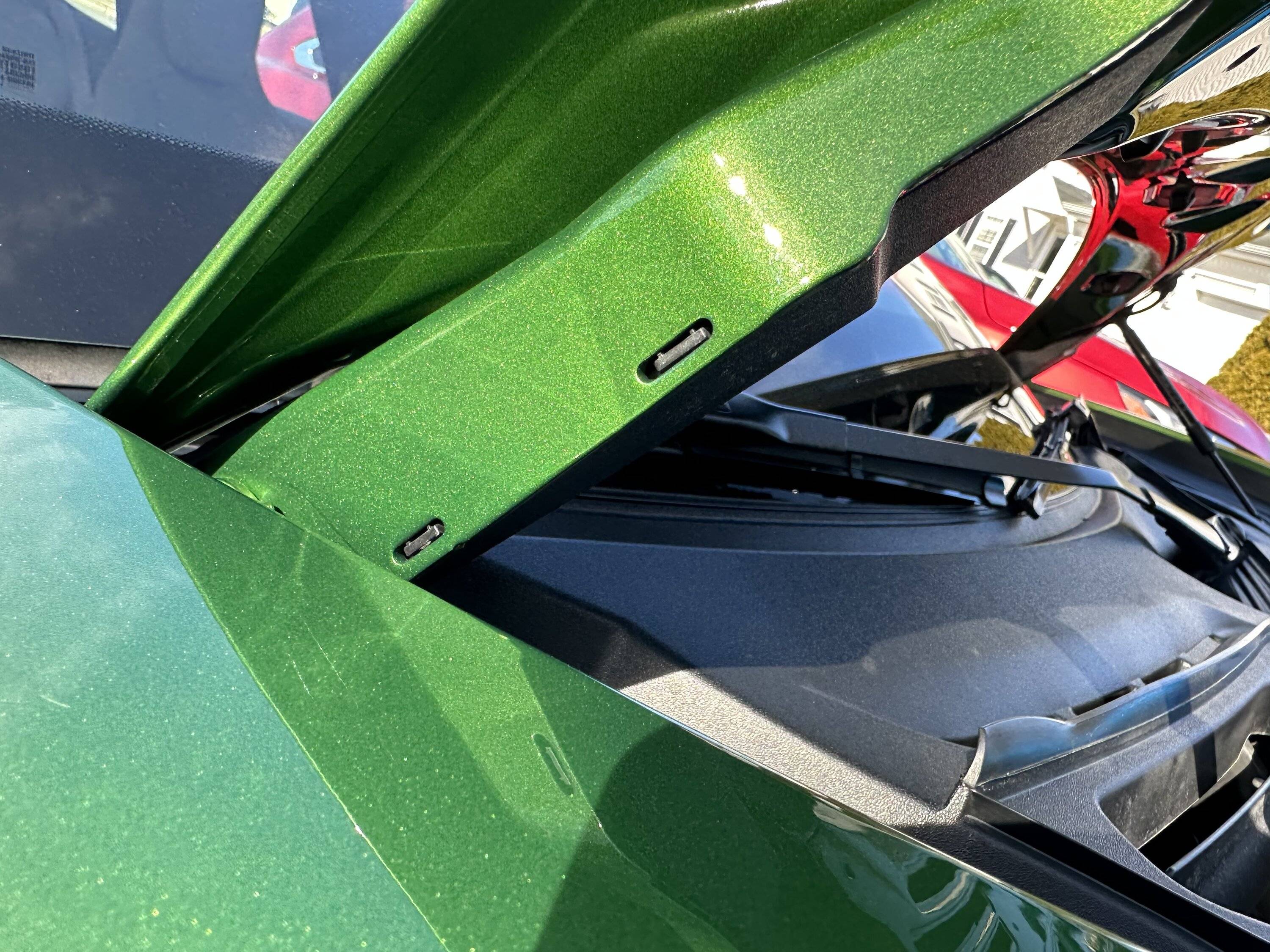 Porsche Taycan Black plastic hinge covers (under front hood) always loose BE3B5001-4680-4F0C-9F3D-5C9A78DD0365