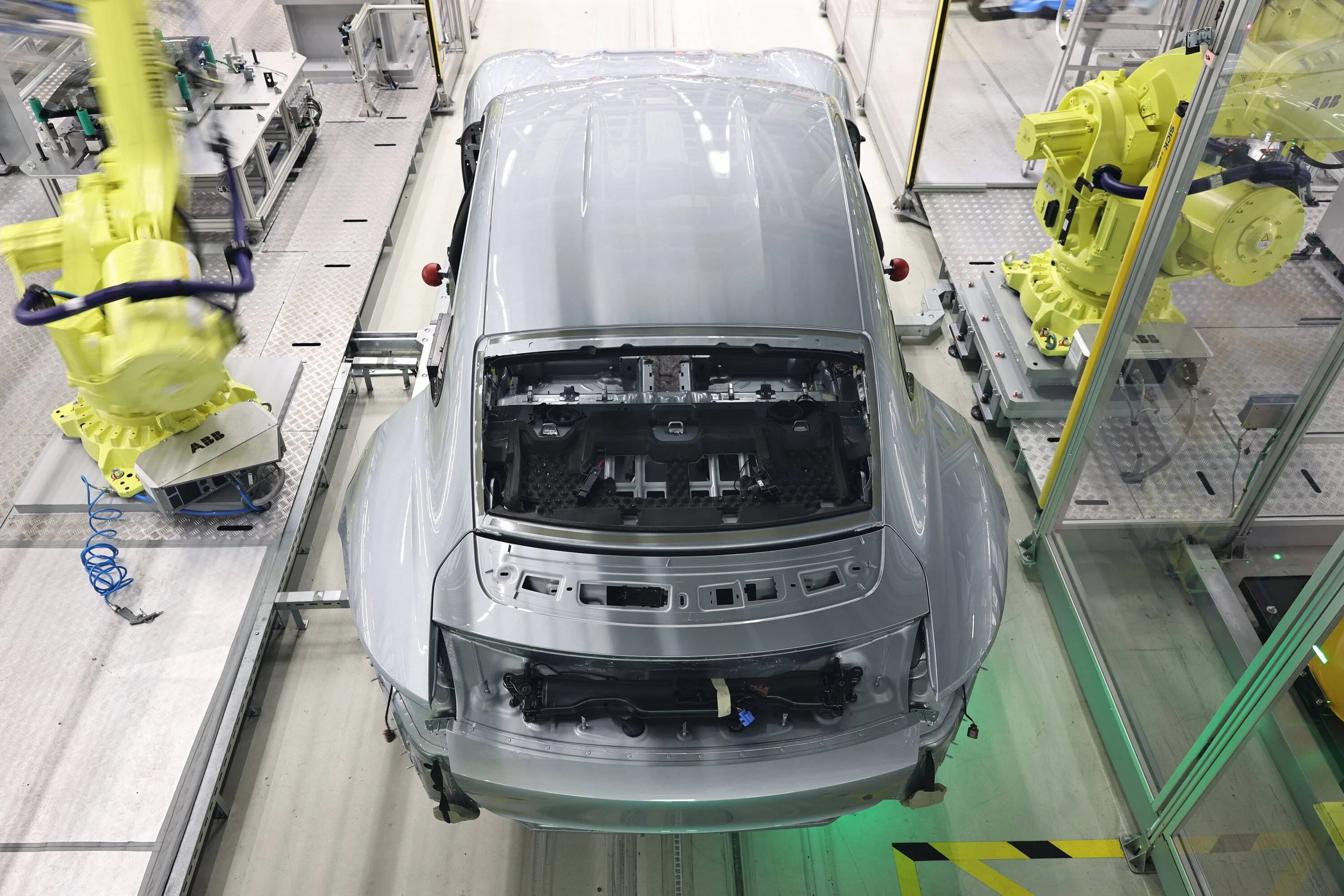 Porsche Taycan Stuttgart to Sydney...and beyond Taycan_GTS_Taycan_assembly_installation_rear_windo