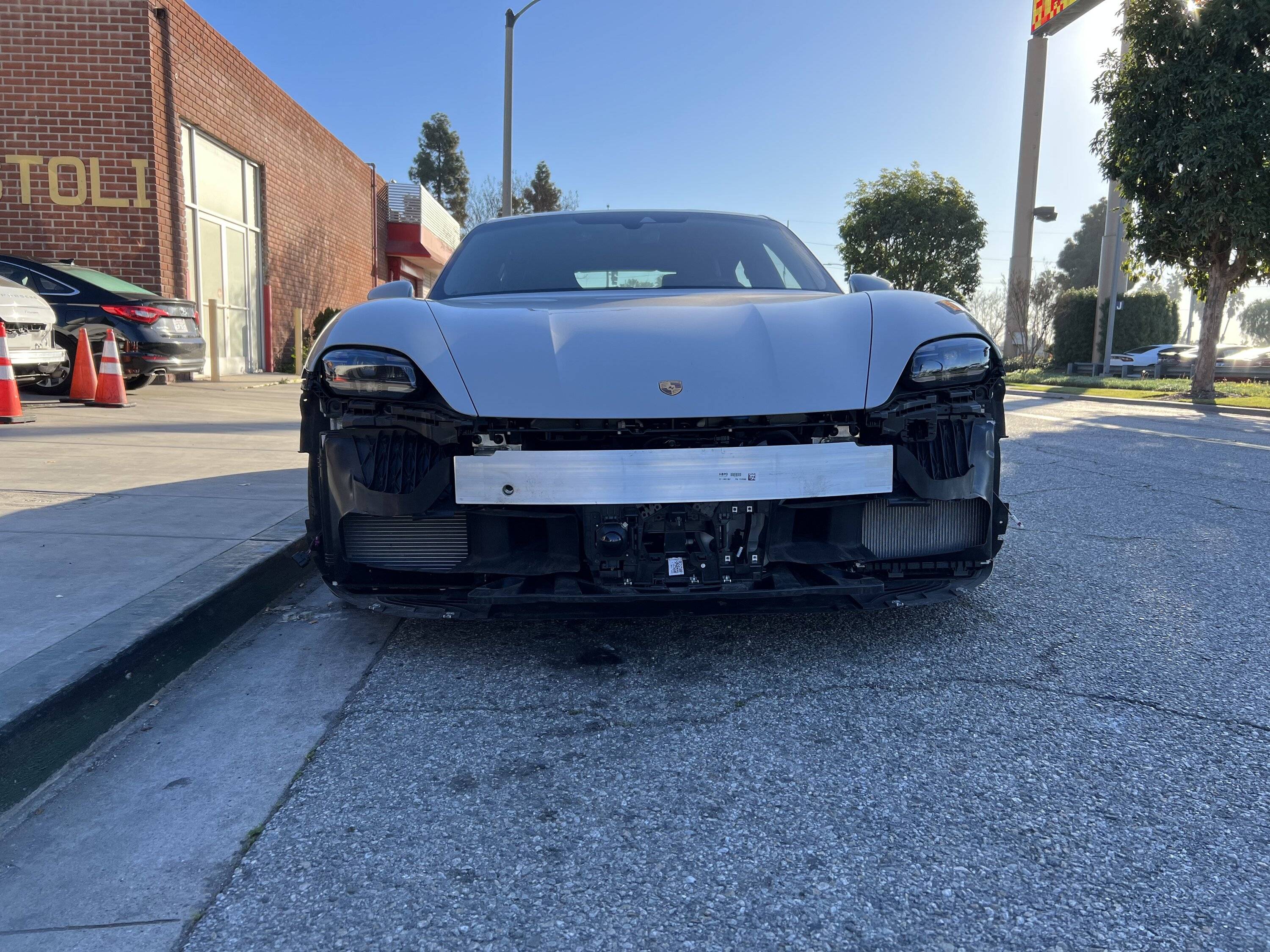 Porsche Taycan Remove front lip IMG_7226.JPEG