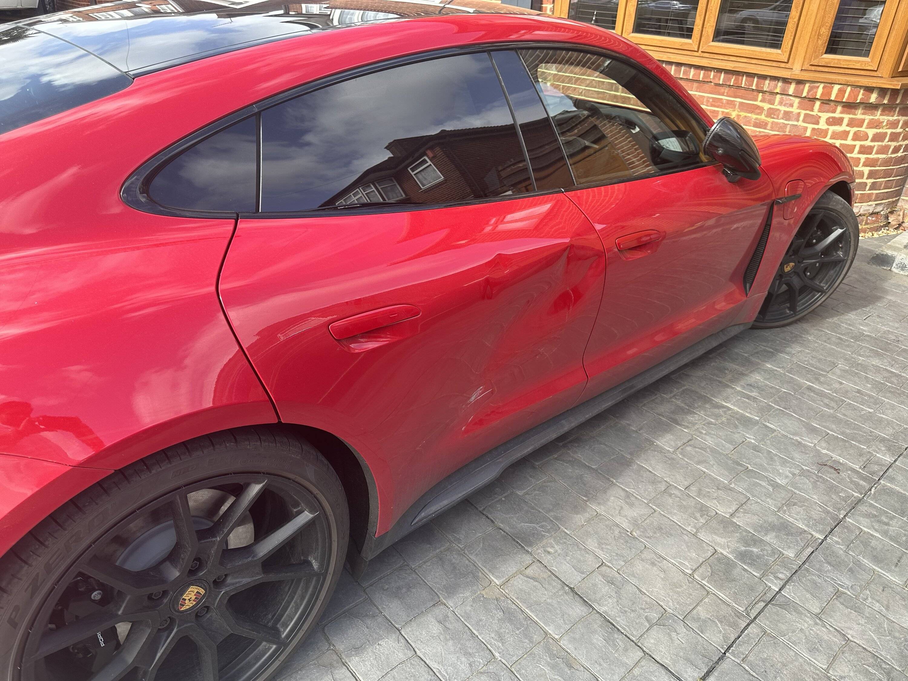 Porsche Taycan Damaged rear door B7628C16-81FC-4789-99AD-7CA1447A8696