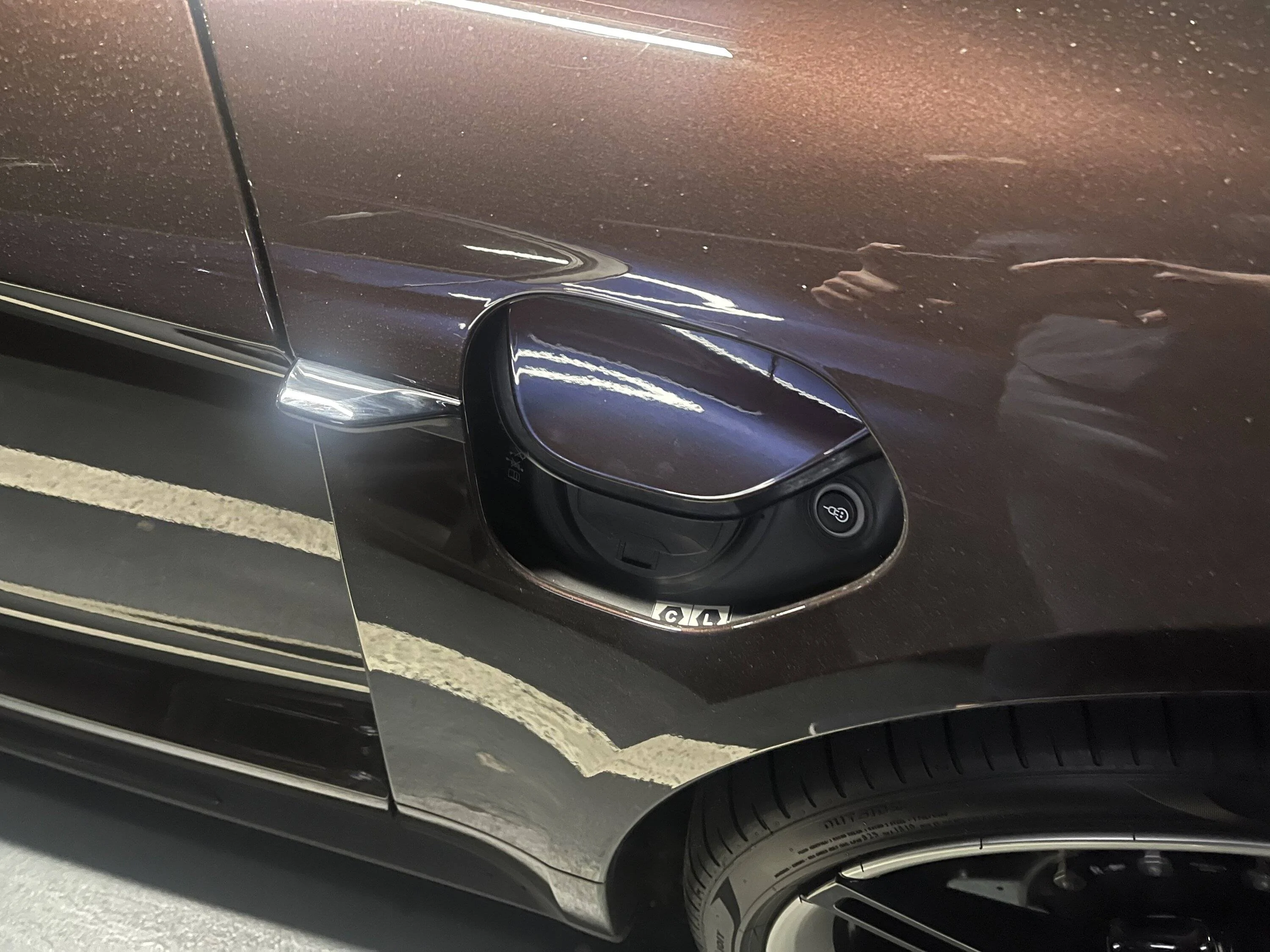 Porsche Taycan Driver's side Charging Port door won't close and Passenger side won't open. A7D29E4E-8EDA-4422-A51C-CCC94760CB76