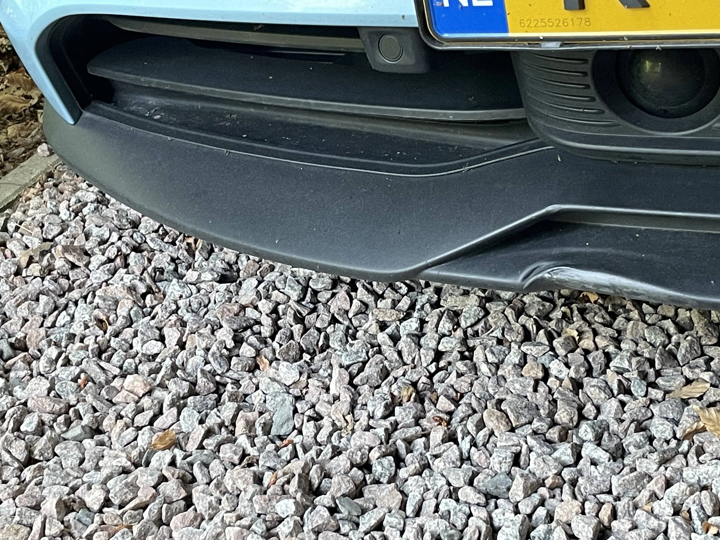 Porsche Taycan Damaged lower part of the front bumper IMG_7914