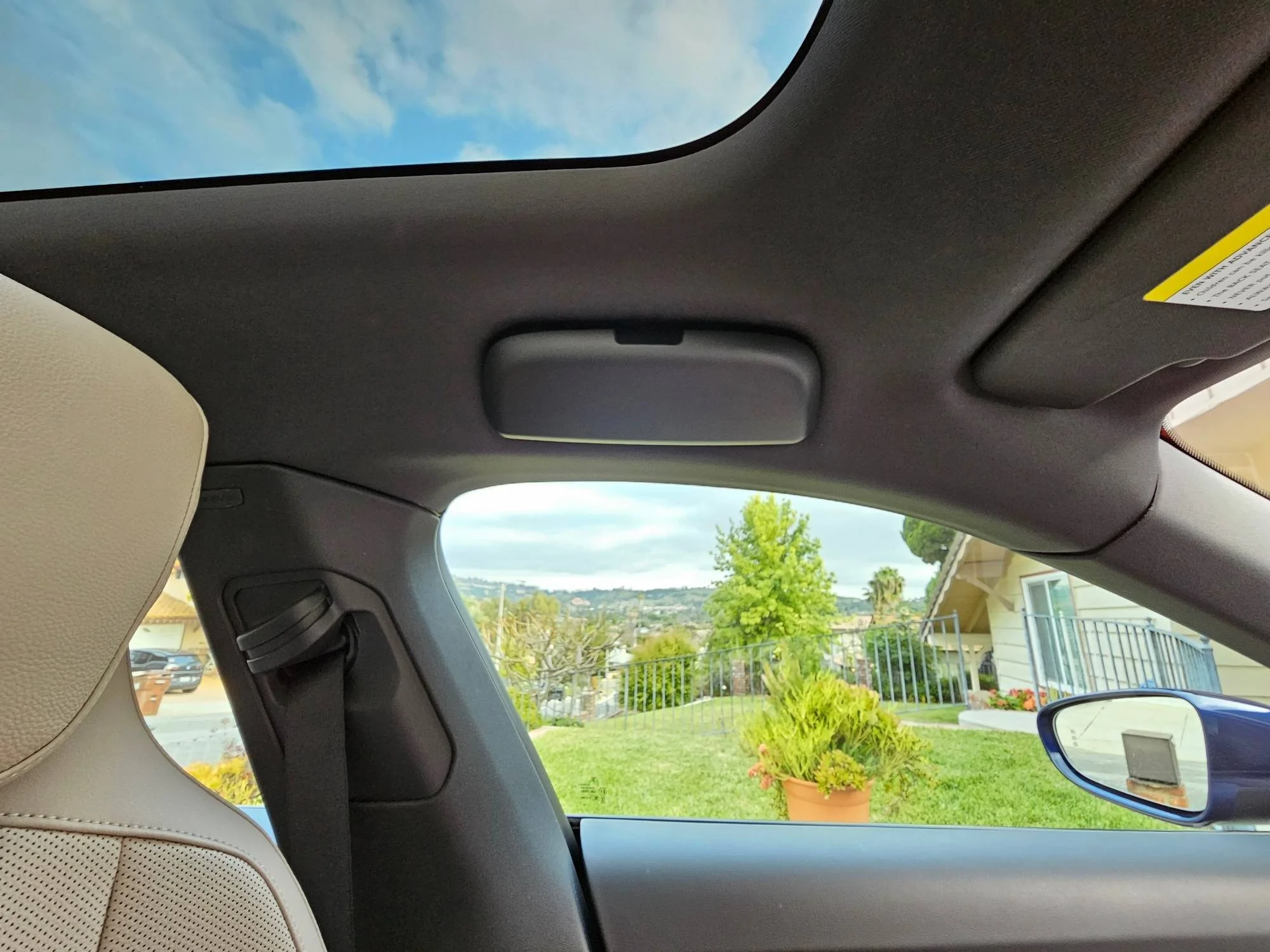 Porsche Taycan Sunglasses holder in place of grab handle handle closed