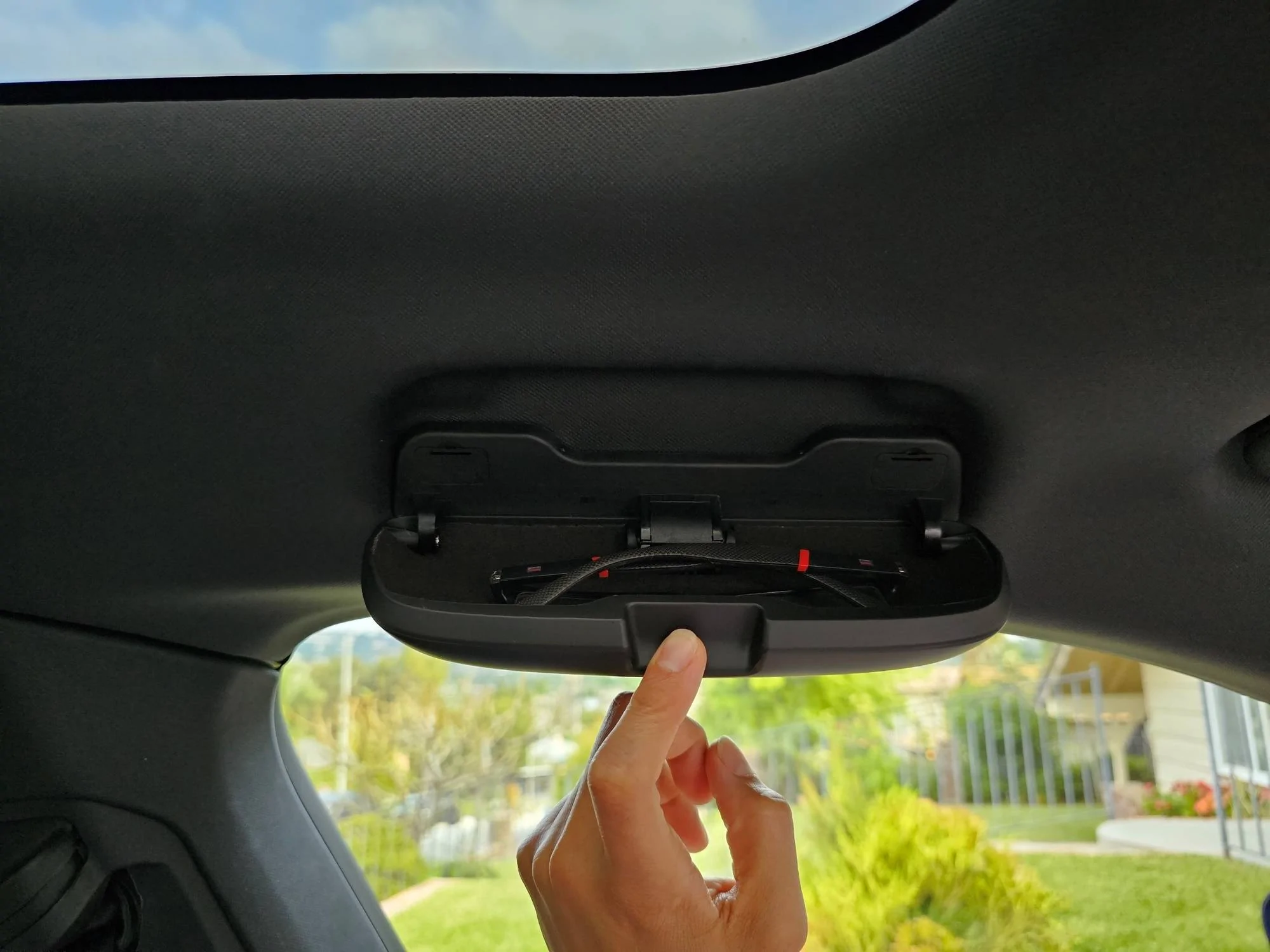 Porsche Taycan Sunglasses holder in place of grab handle handle us