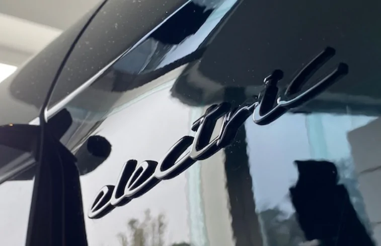 Porsche Taycan “Electric” Logo on doors 1685744987487