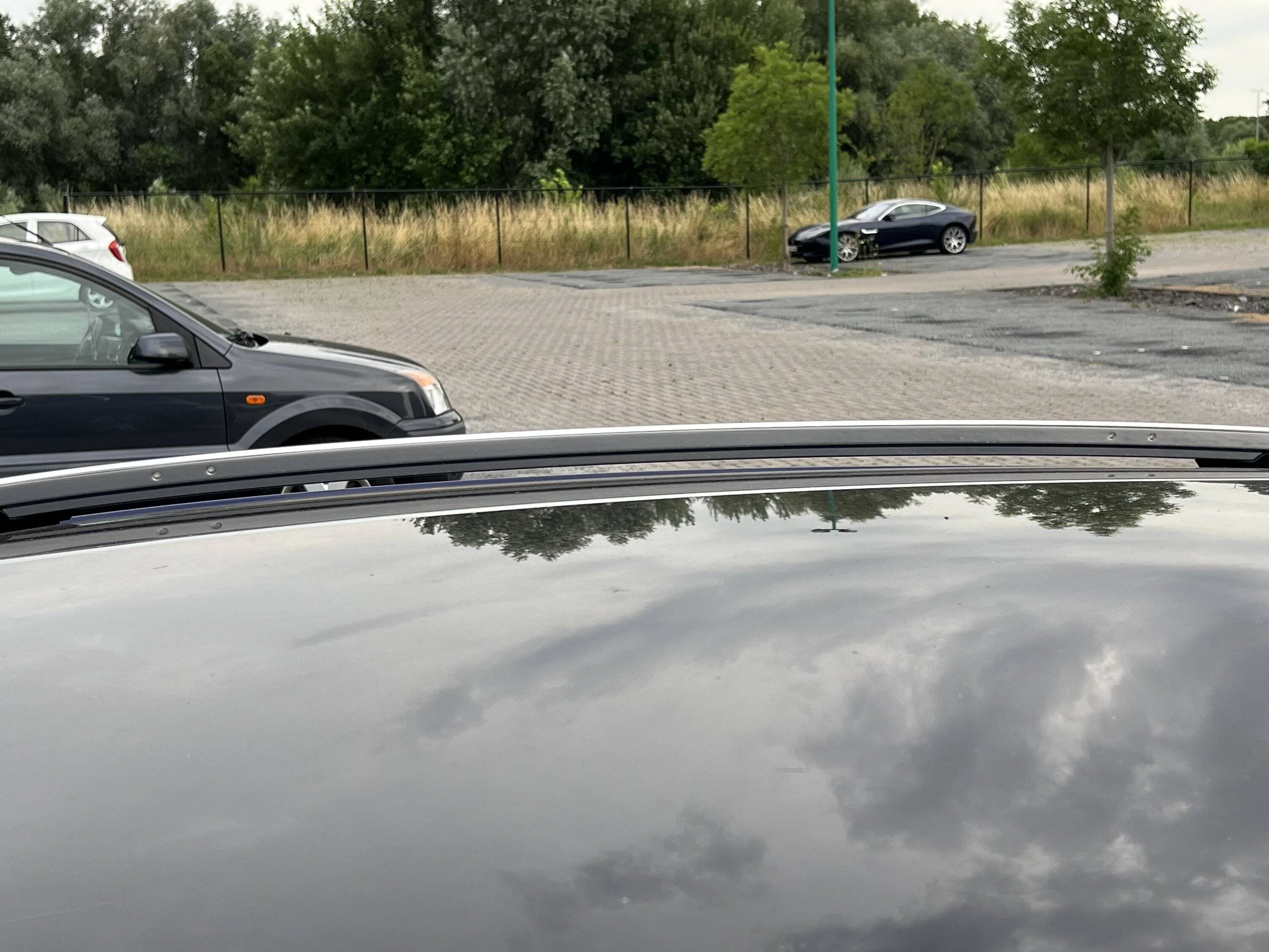 Porsche Taycan Taycan CT4 w/ 2021 vs 2022 Thule Wingbar Edge , Thule Vector M roofbox IMG_4566