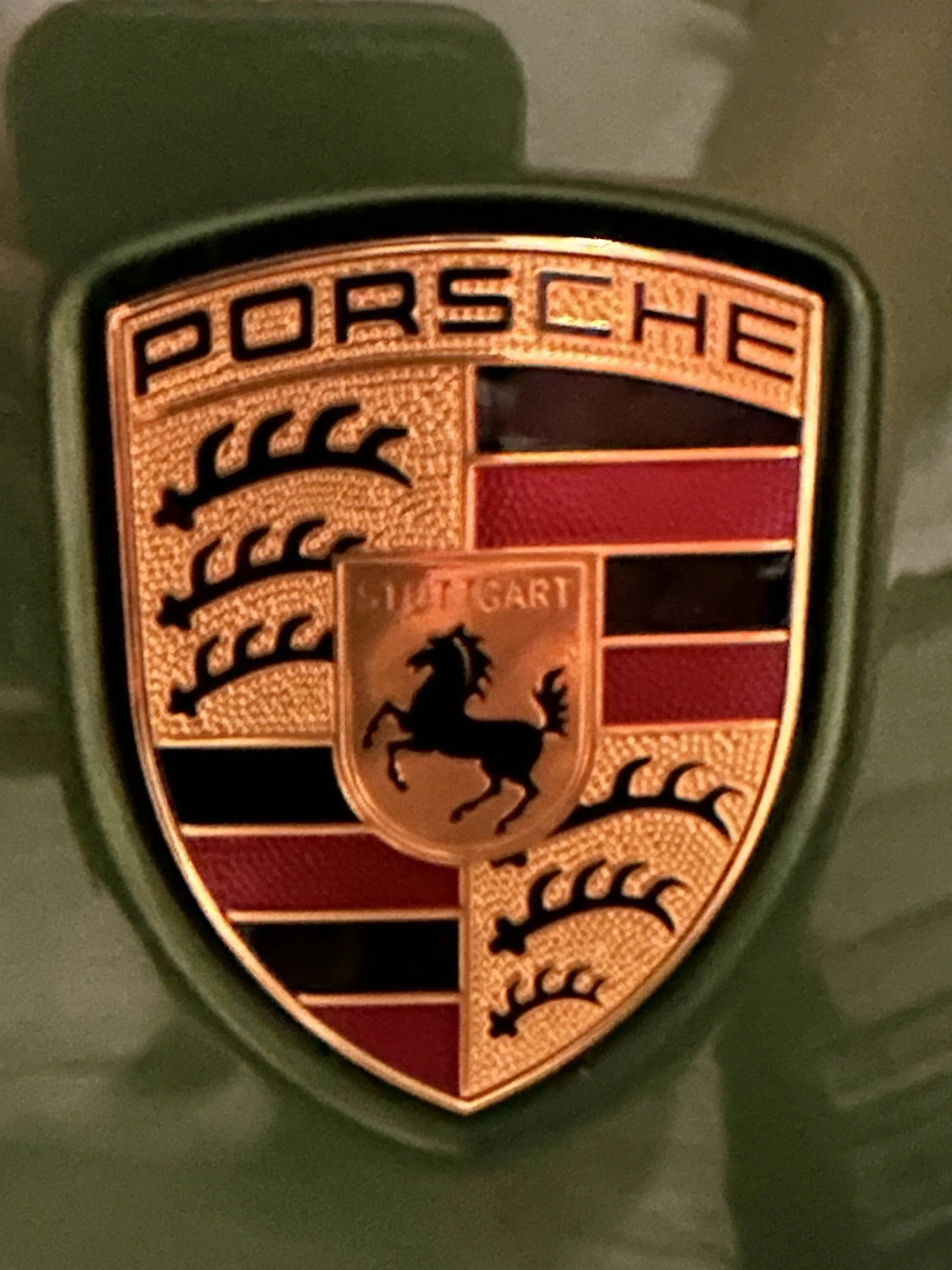 Porsche Taycan Is your hood ornament straight? IMG_2109