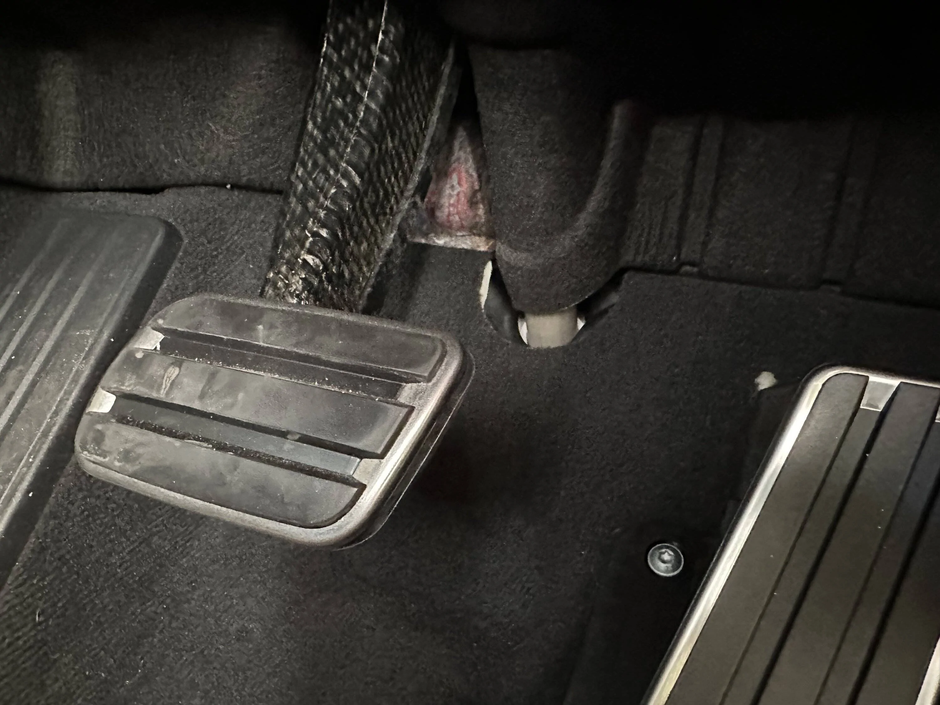 Porsche Taycan Brake pedal floor trim section missing? IMG_2571