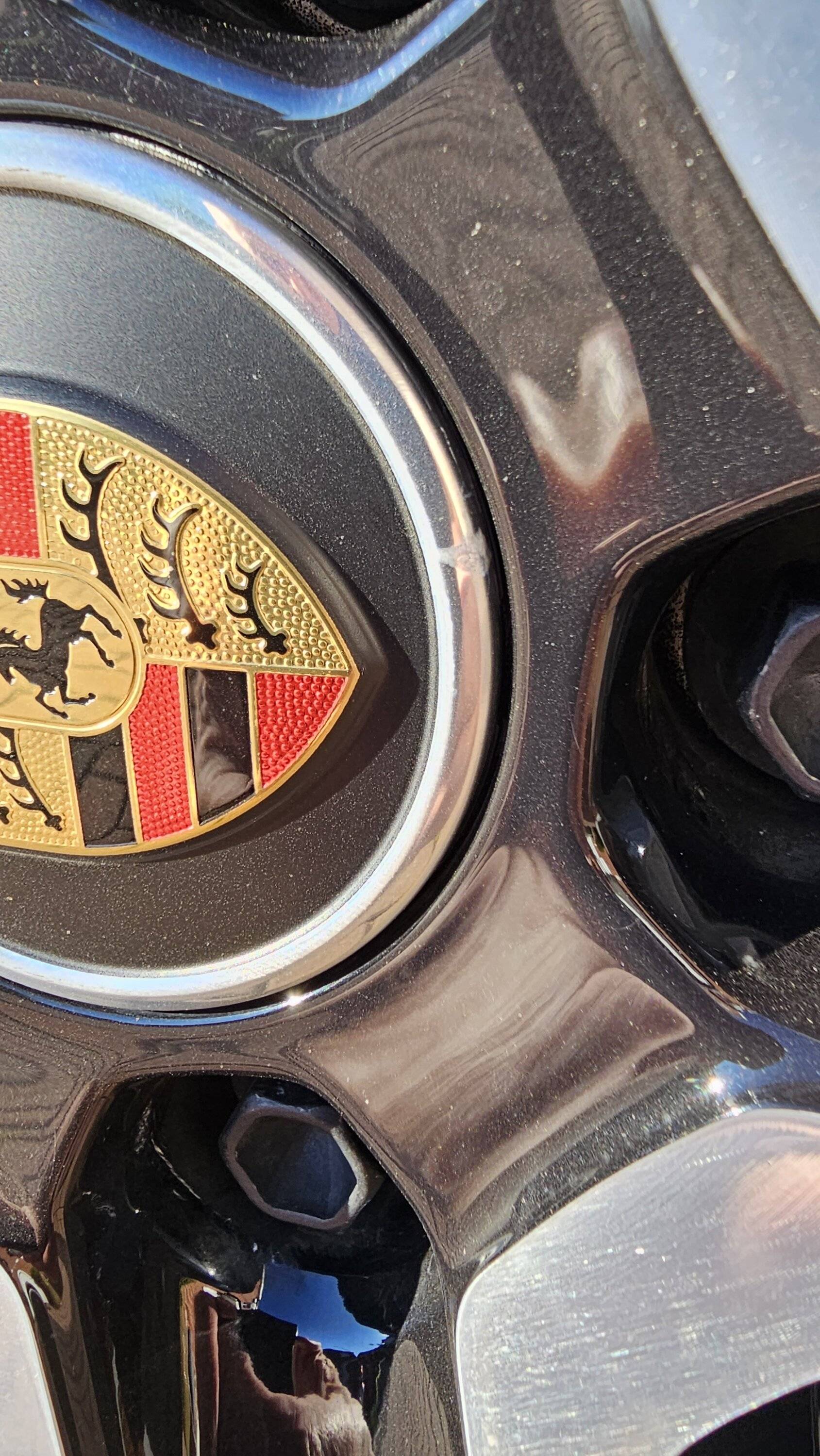 Porsche Taycan Corroding Wheel Centre Caps 20230810_080329