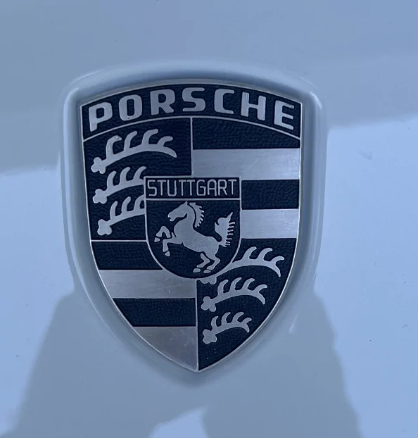 Porsche Taycan Need monochrome replacement hood emblem 1692926093397
