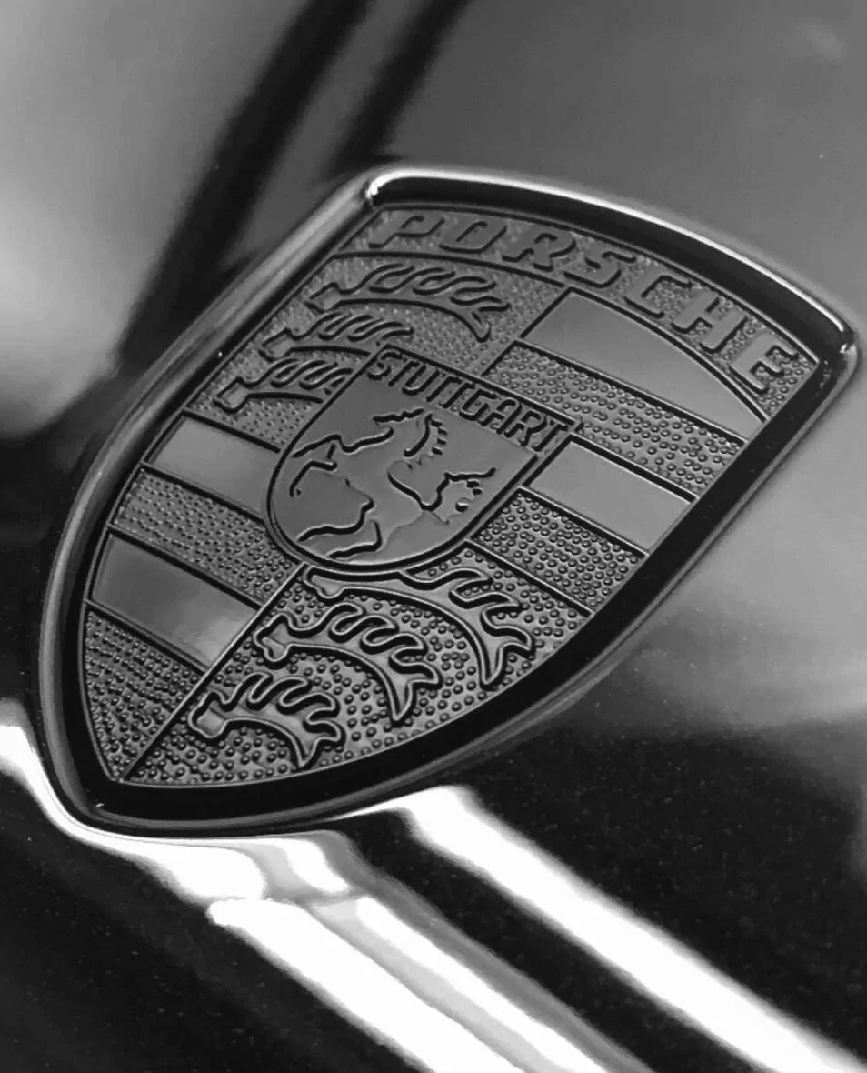 Porsche Taycan Need monochrome replacement hood emblem Screenshot 2023-08-25 at 1.05.38 AM