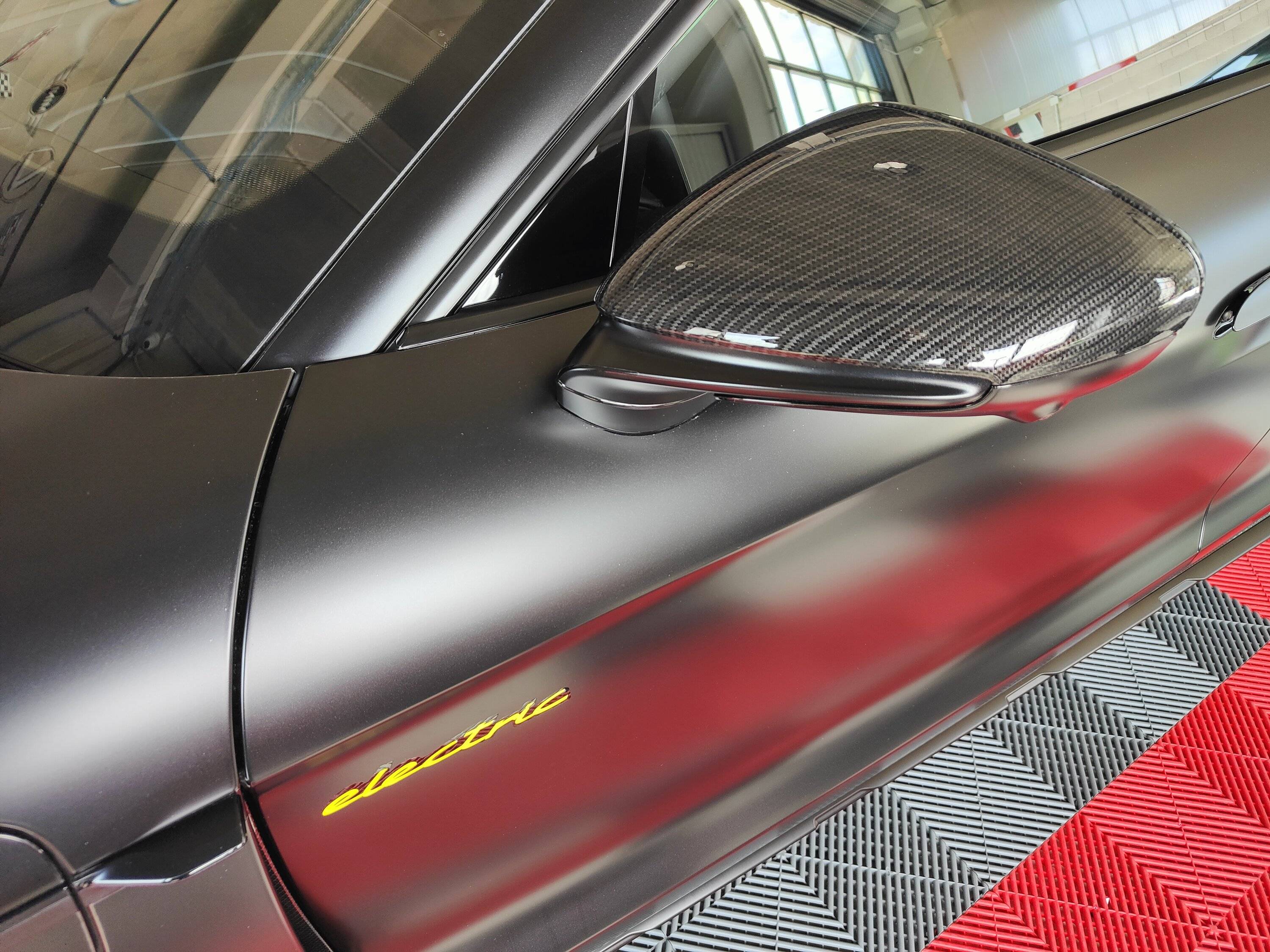 Porsche Taycan MY23 CT4S in satin and carbon fiber, need help with rim protector and ideas for garage floor IMG20230721152027.JPG