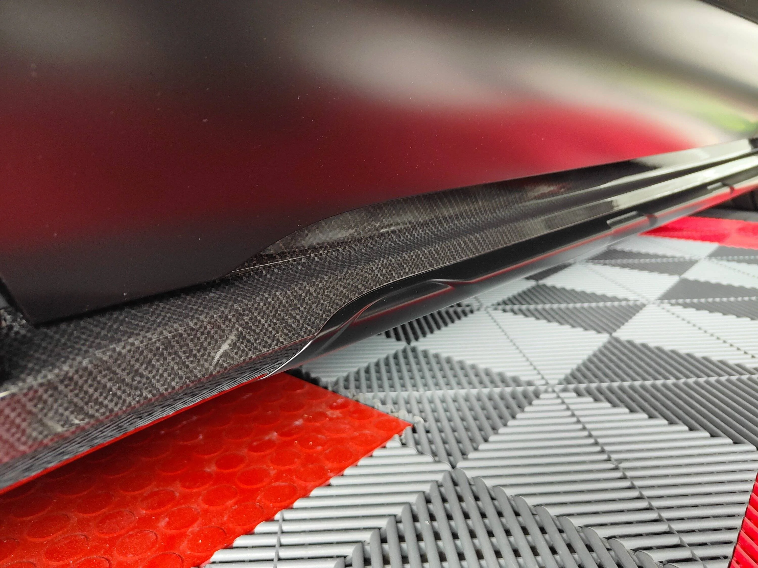 Porsche Taycan MY23 CT4S in satin and carbon fiber, need help with rim protector and ideas for garage floor IMG20230721192907