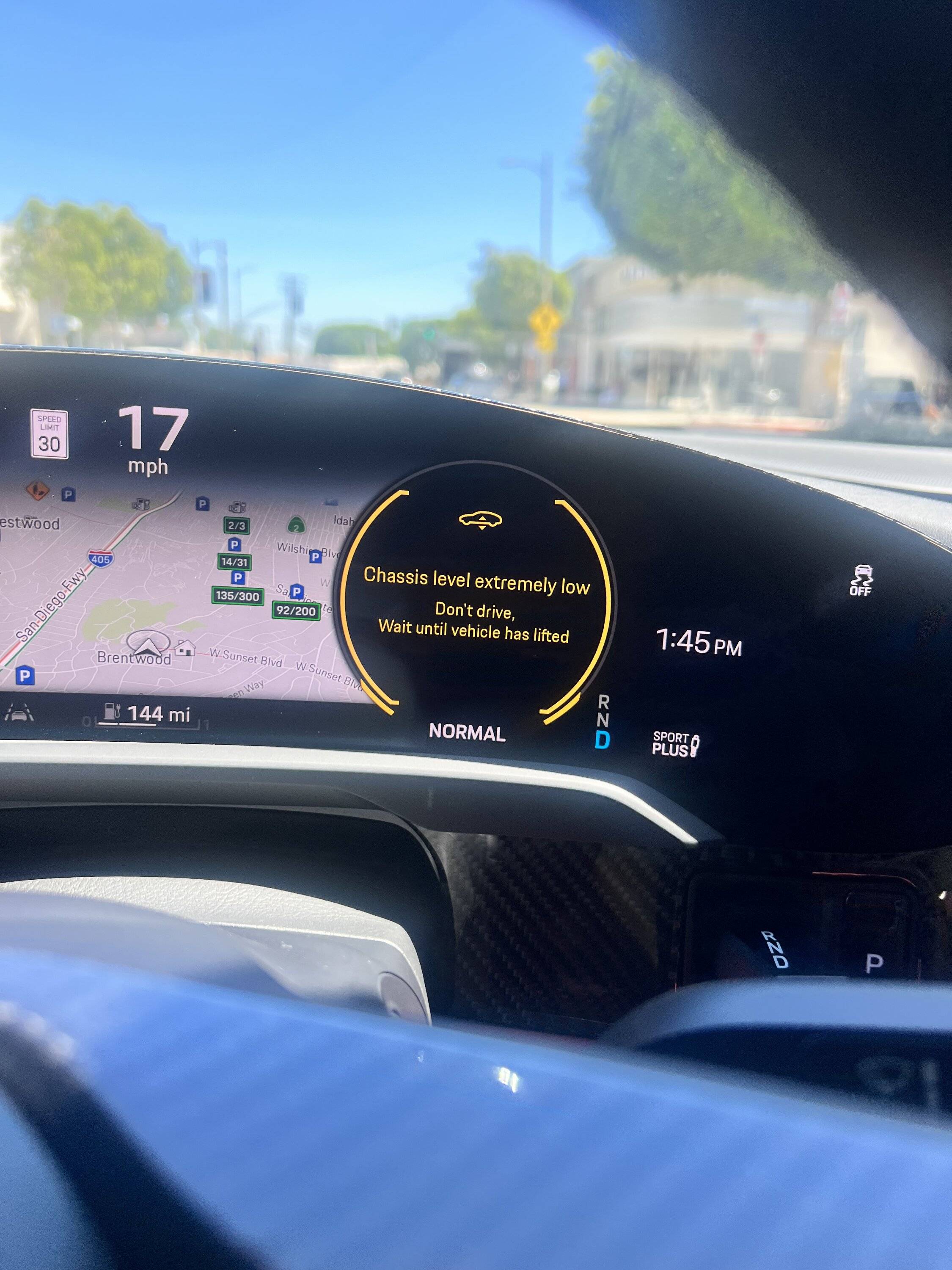 Porsche Taycan Air suspension issue on Taycan 4S?? "Chassis level extremely low" Anyone else experience this? IMG_1994