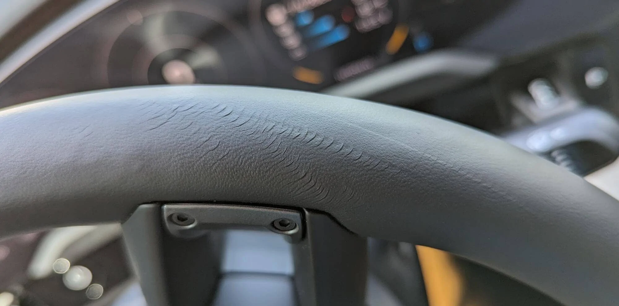 Porsche Taycan Leather Steering wheel cracks 1693417704903