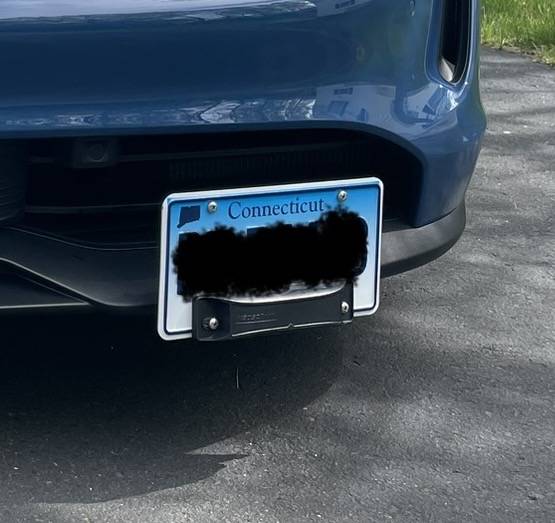 Porsche Taycan Front license plate states IMG_4213