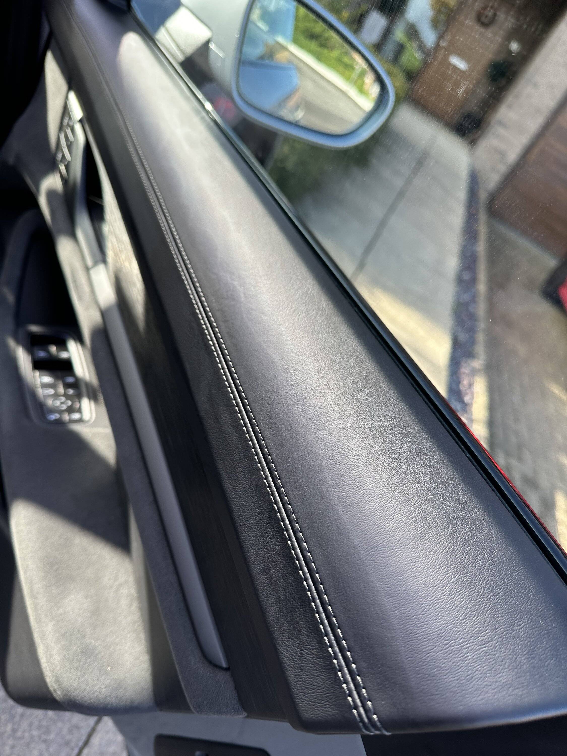 Porsche Taycan Marks developing on leather door interior IMG_1621
