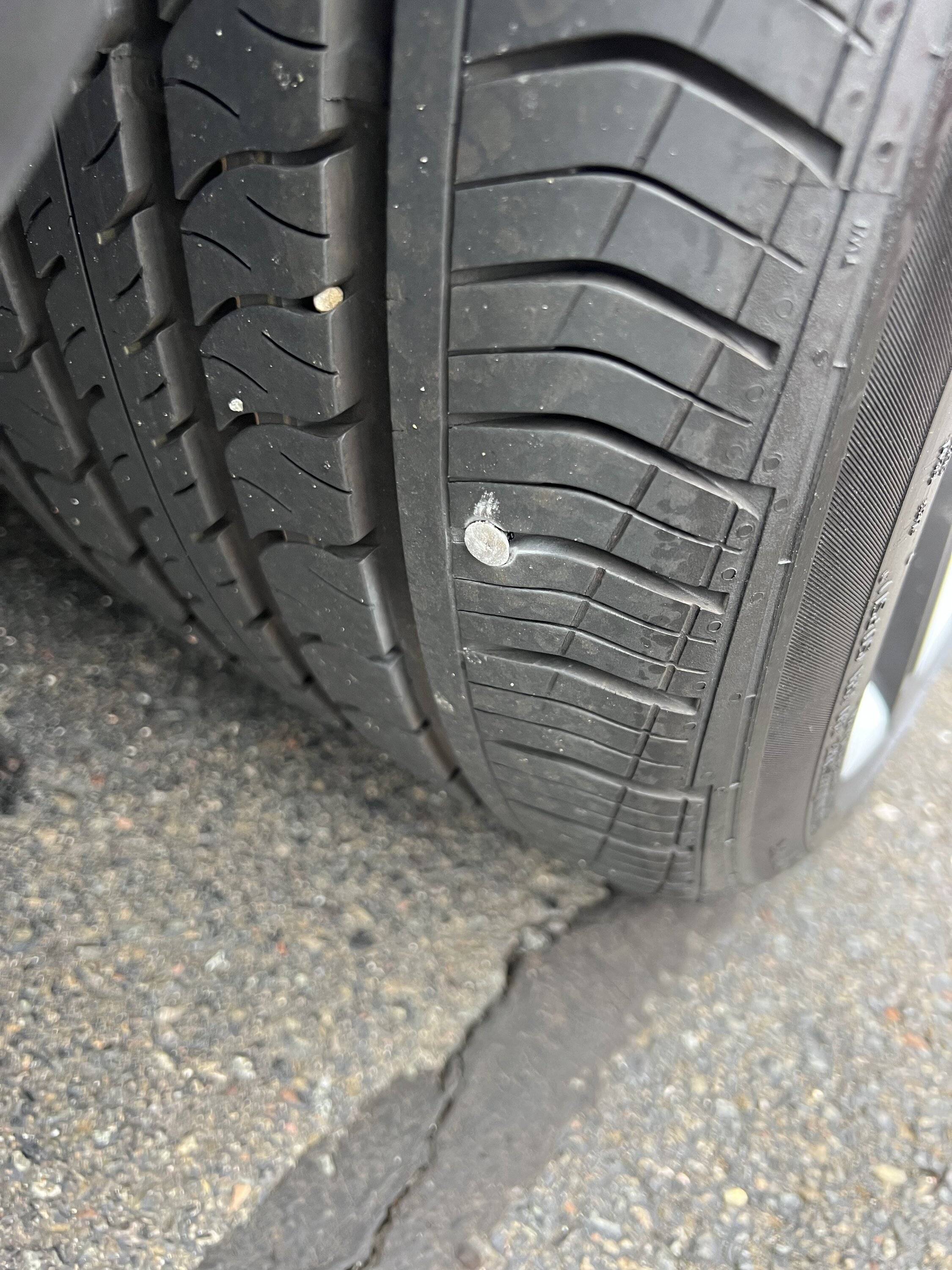 Porsche Taycan Nail in tire IMG_2417