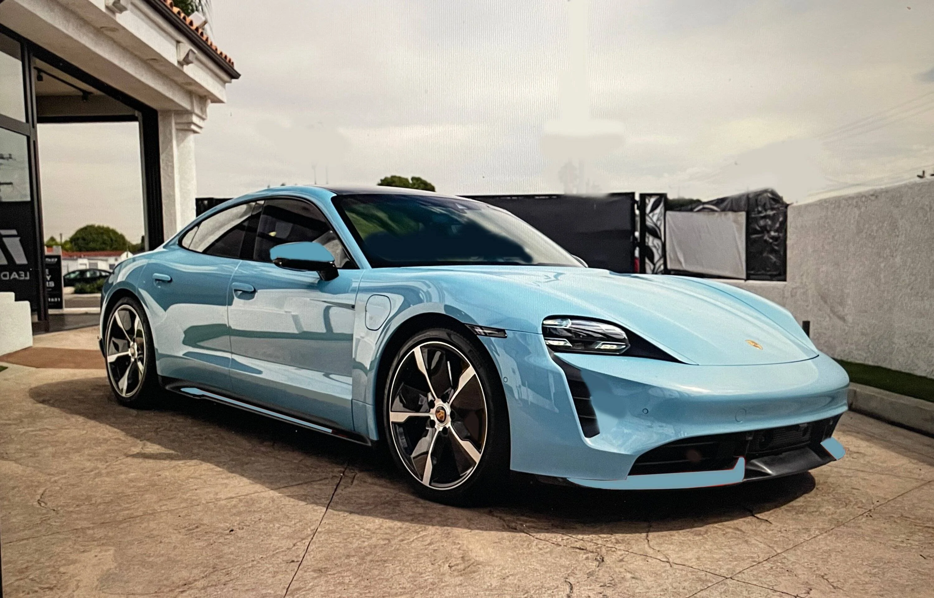 Porsche Taycan Turbo bumper & side skirts paint colors taycan cali frzn blueblue accents