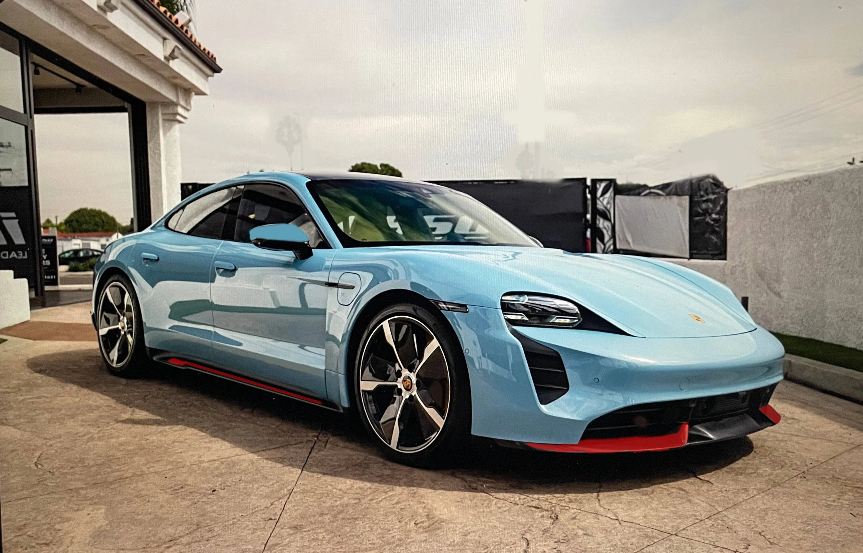 Porsche Taycan Turbo bumper & side skirts paint colors taycan cali frzn blue red accents