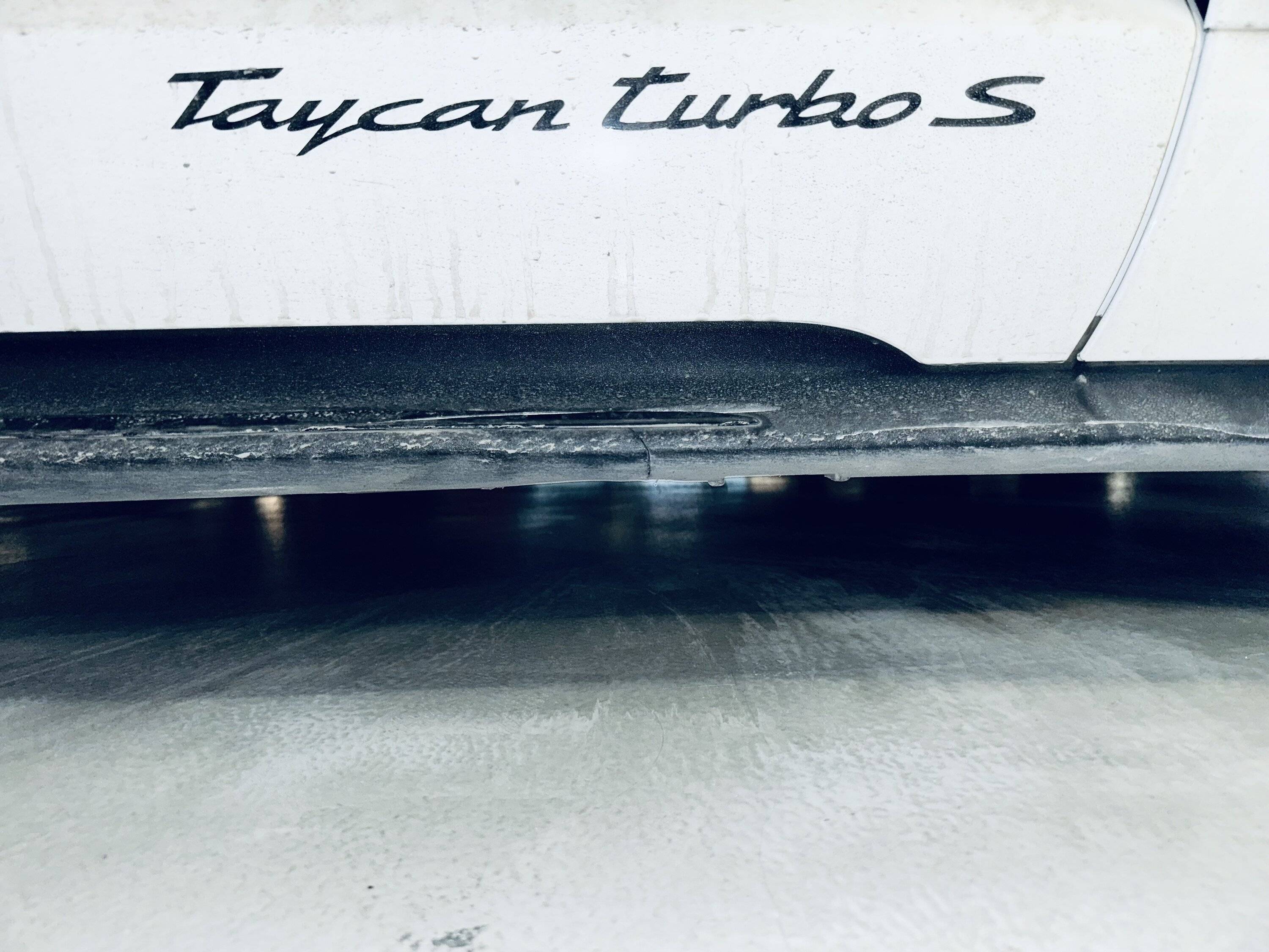 Porsche Taycan Bottomed out in parking lots - damaged side skirts and jack stand bracket (repair info inside) IMG_5144