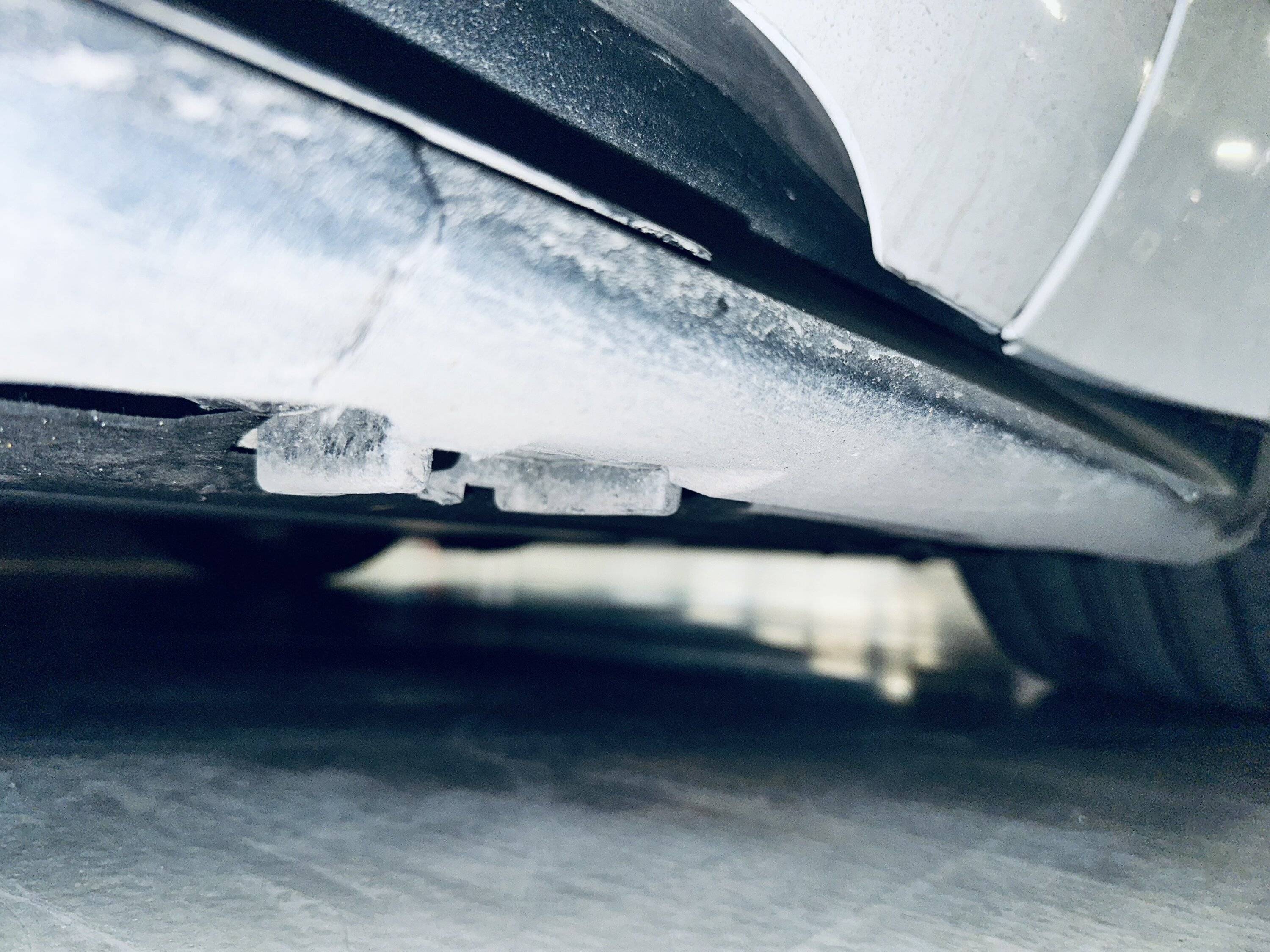 Porsche Taycan Bottomed out in parking lots - damaged side skirts and jack stand bracket (repair info inside) IMG_5143