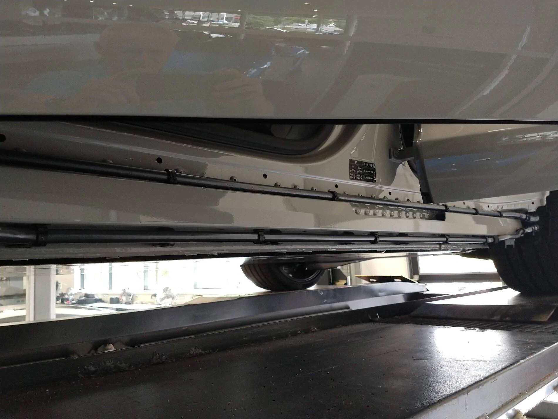Porsche Taycan Bottomed out in parking lots - damaged side skirts and jack stand bracket (repair info inside) 88409265b9de326e601c20e8399cdd47