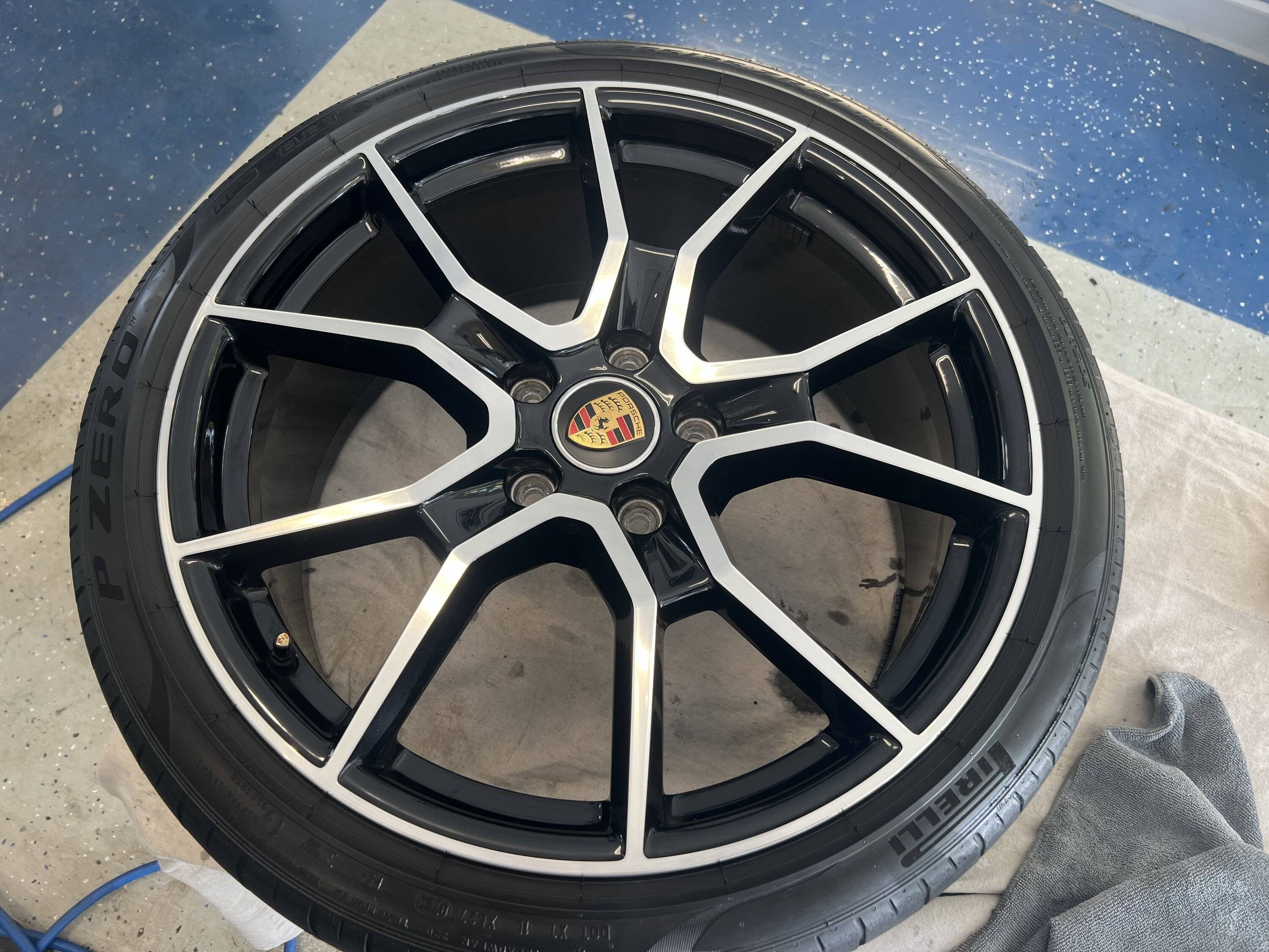Porsche Taycan Porsche OEM 21” RS Spyder Design wheels for sale. Price lowered. IMG_2319
